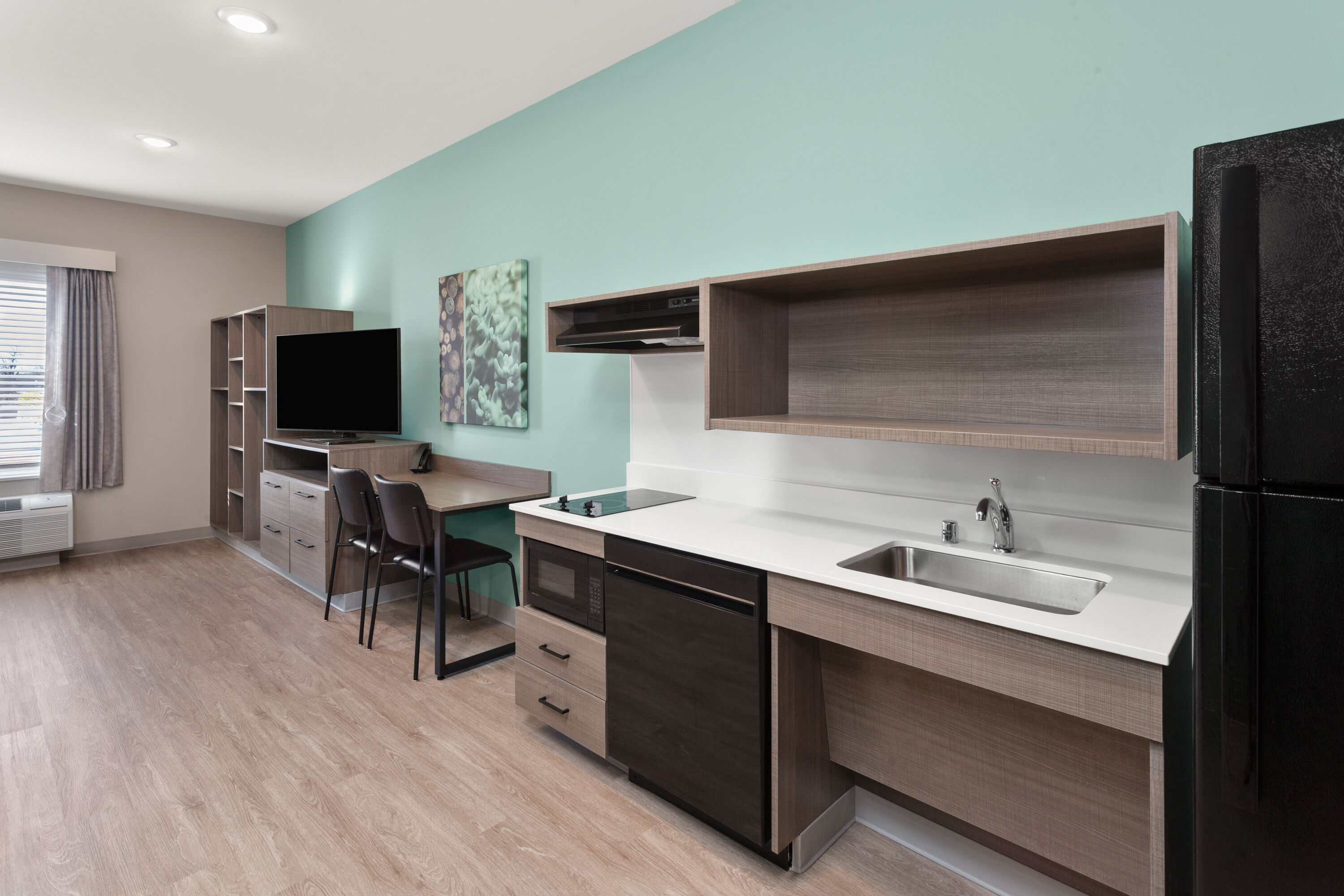 Guest room at the ECHO Suites Extended Stay by Wyndham Madison in Madison, Wisconsin