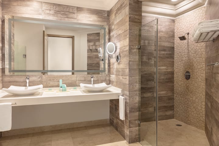 Guest room bath at the Wyndham Alltra Playa del Carmen Adults Only All Inclusive in Playa del Carmen, Other than US/Canada