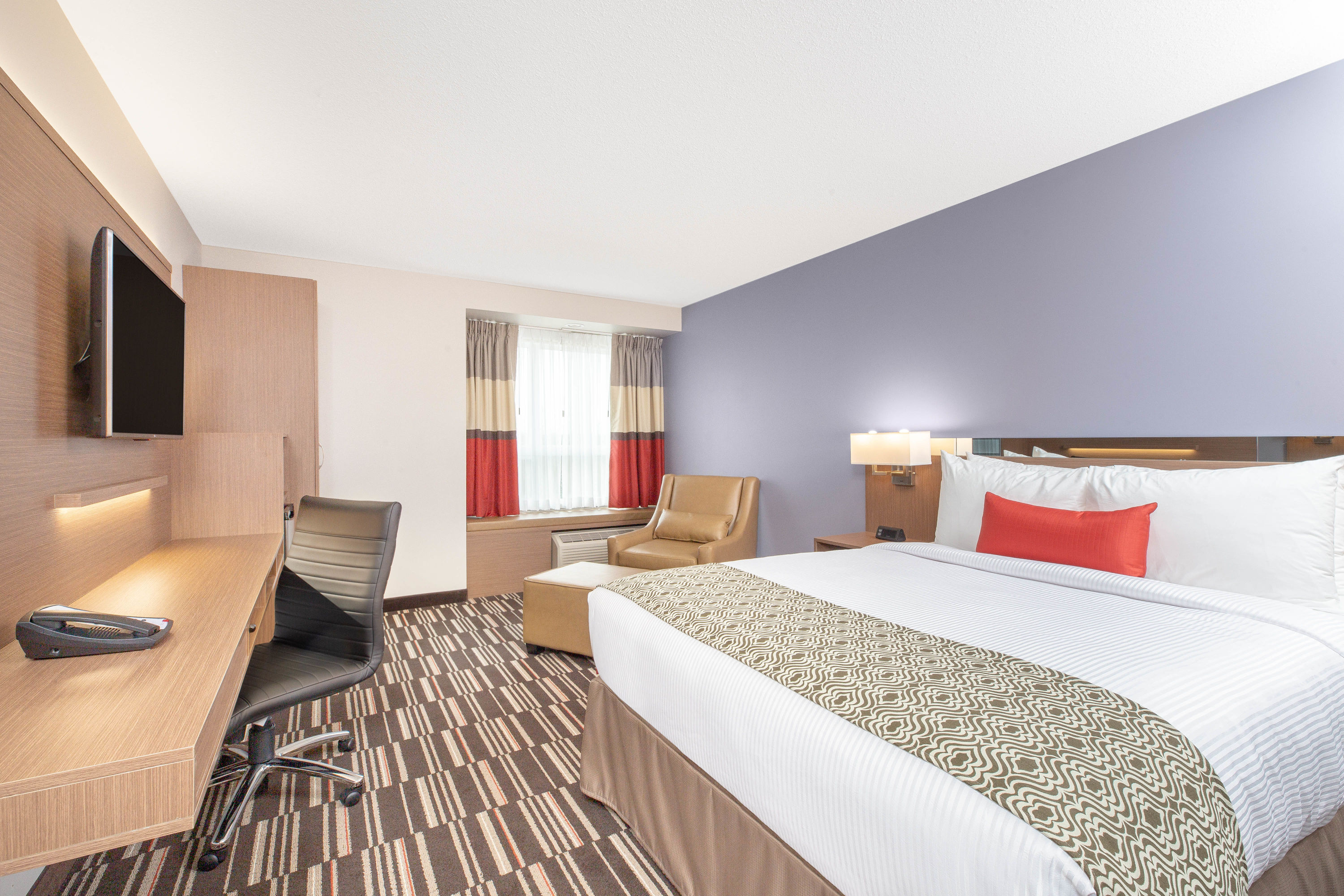 Guest room at the Microtel Inn & Suites by Wyndham Fort McMurray in Fort McMurray, Alberta