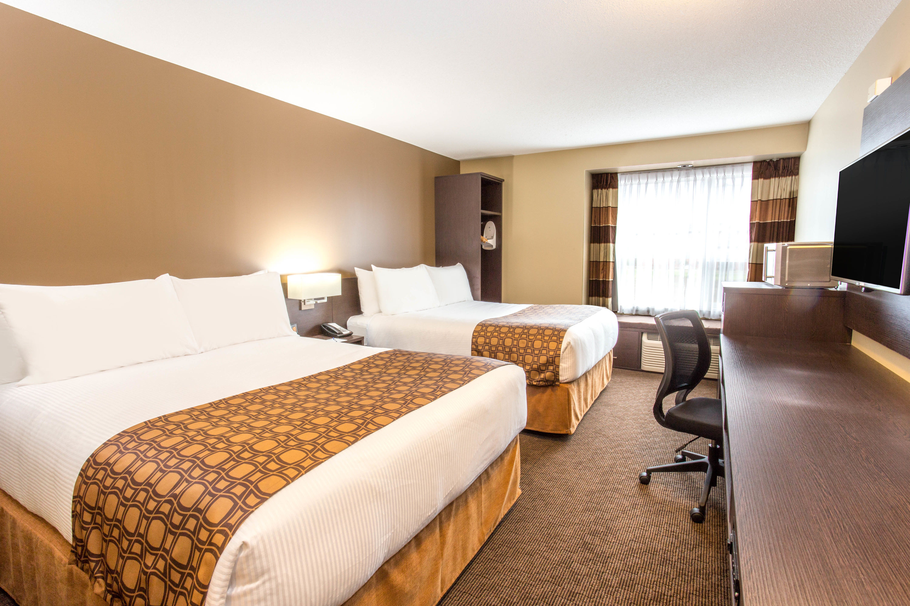 Guest room at the Microtel Inn & Suites by Wyndham Whitecourt in Whitecourt, Alberta