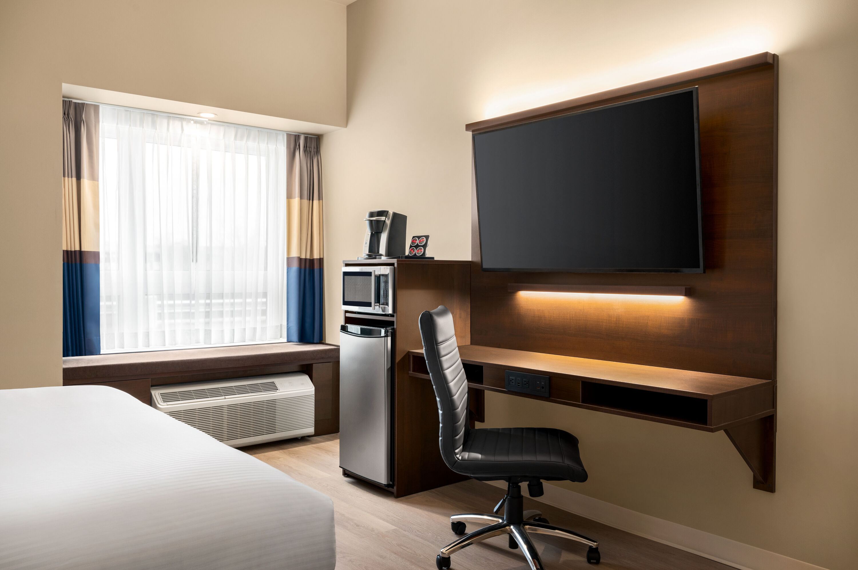 Guest room at the Microtel Inn & Suites by Wyndham Aurora in Aurora, Ontario