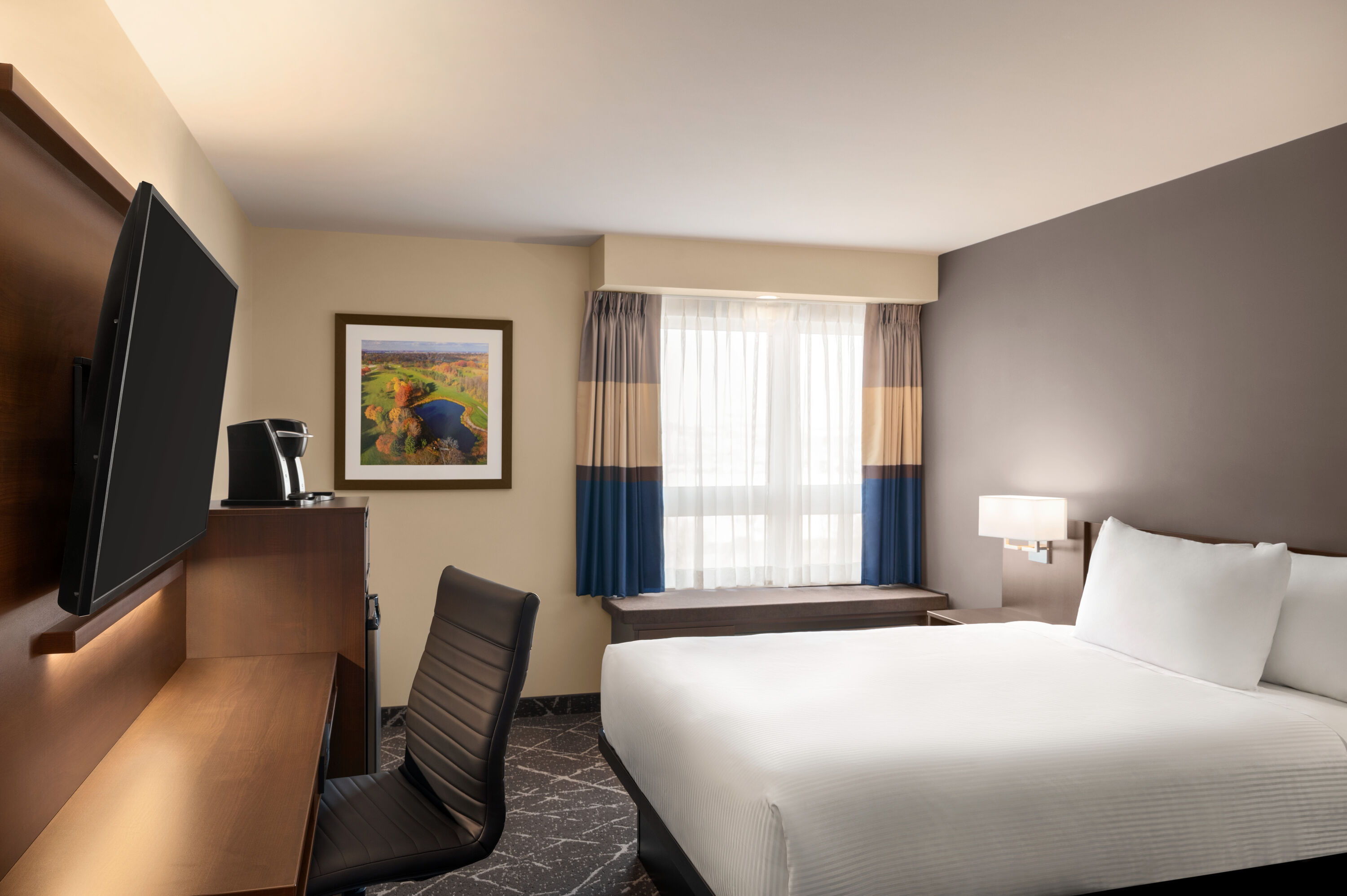 Guest room at the Microtel Inn & Suites by Wyndham Aurora in Aurora, Ontario