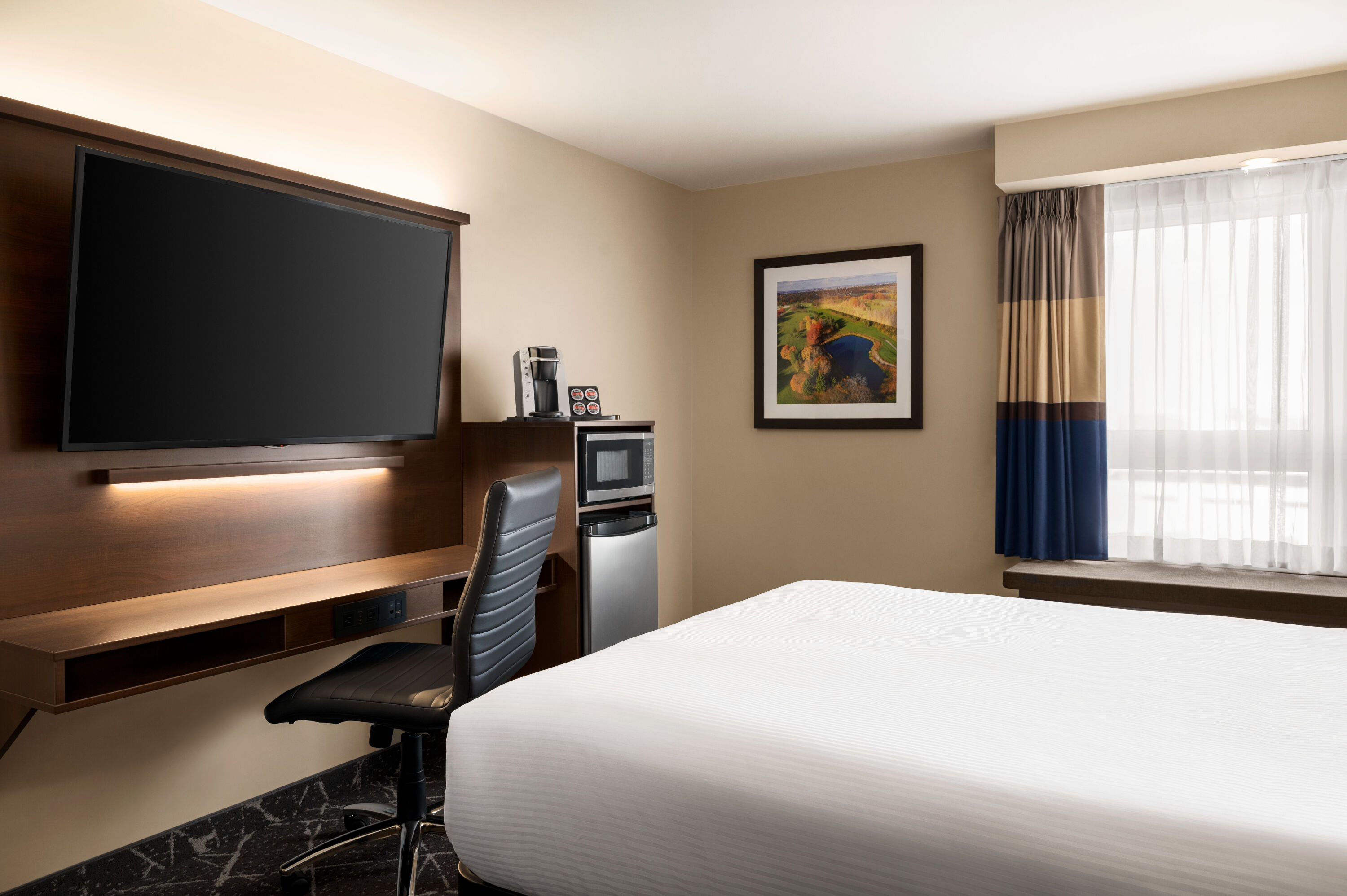 Guest room at the Microtel Inn & Suites by Wyndham Aurora in Aurora, Ontario
