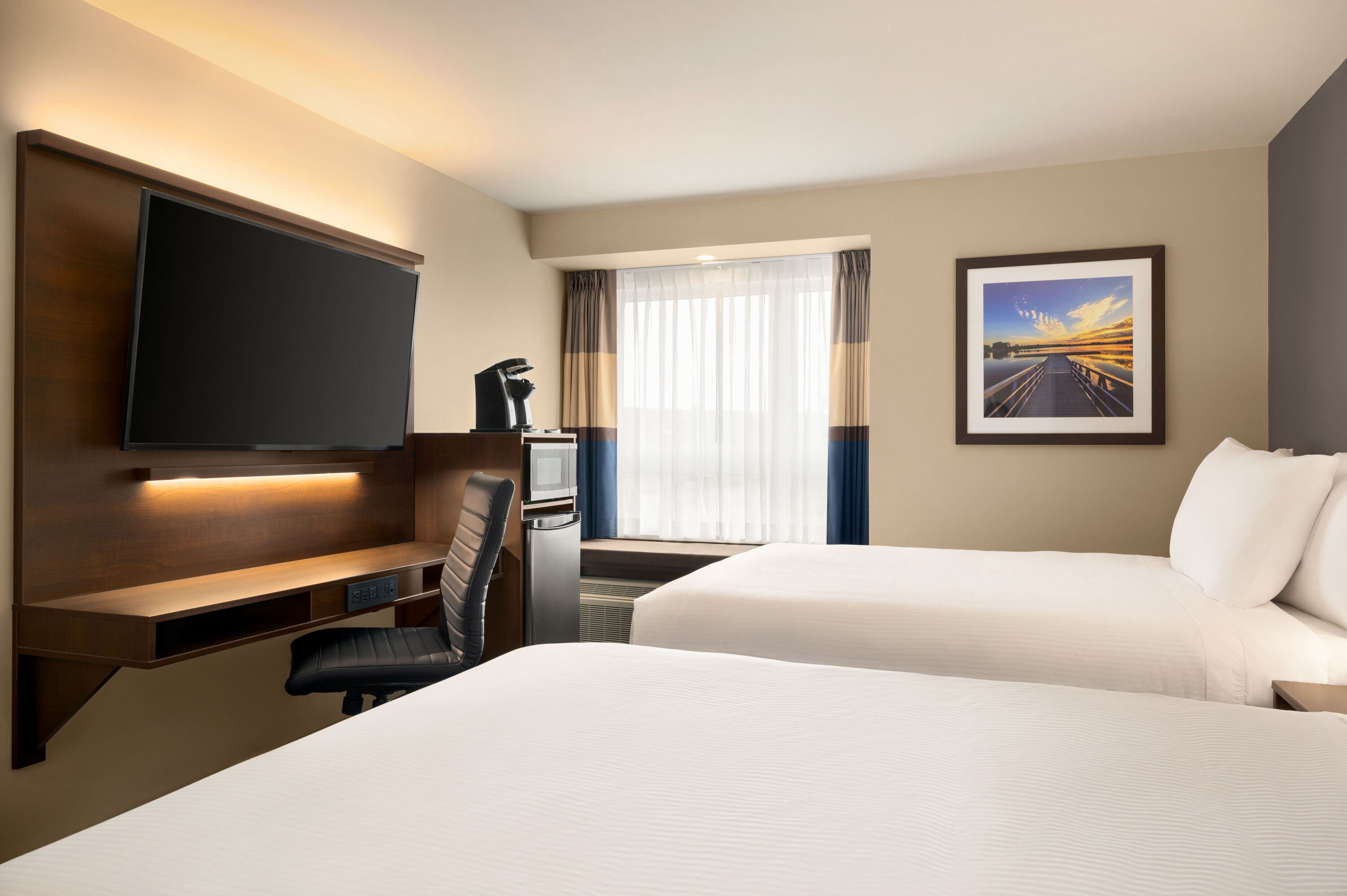 Guest room at the Microtel Inn & Suites by Wyndham Aurora in Aurora, Ontario