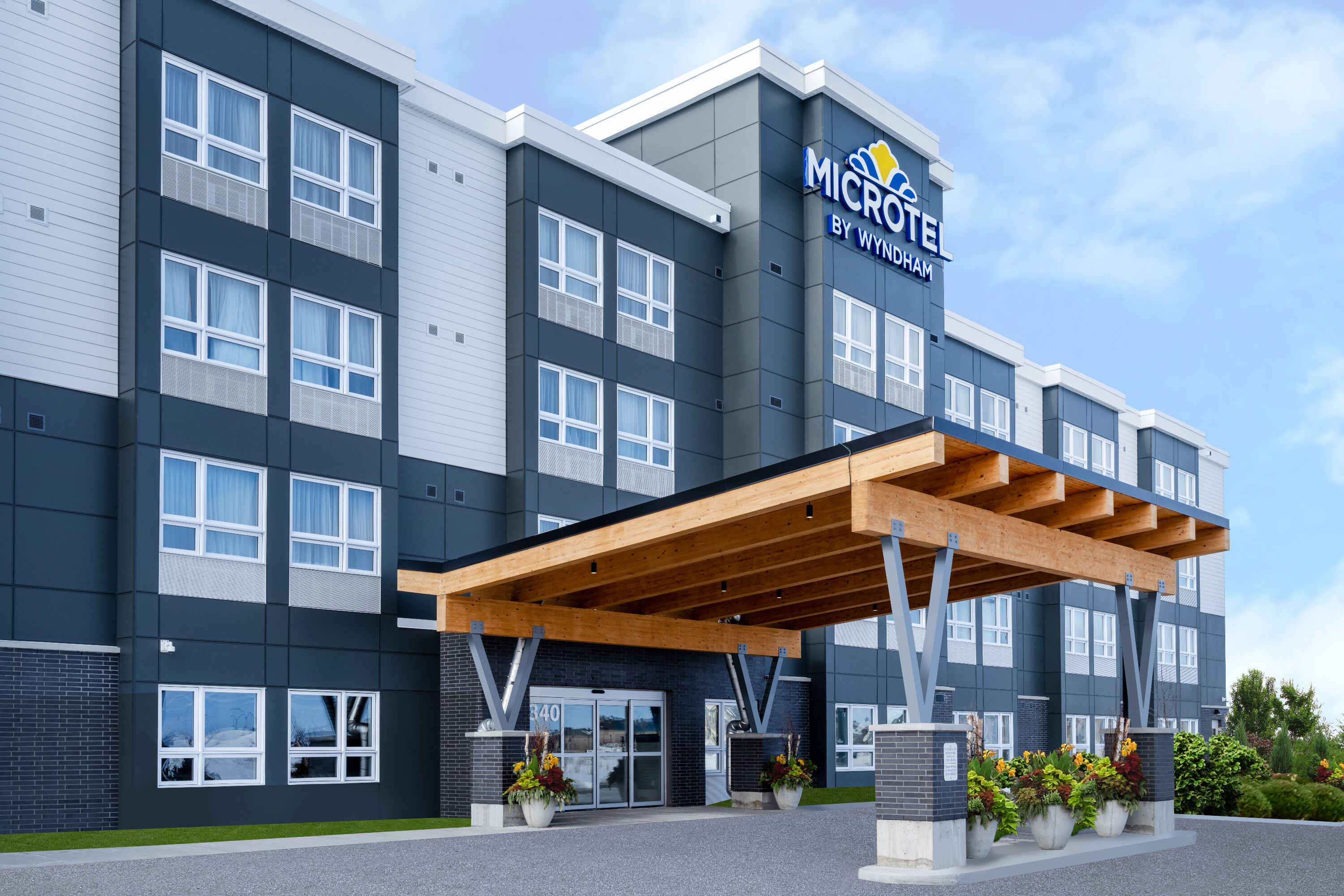 Exterior Day Image of Microtel Inn & Suites by Wyndham Kanata Ottawa West hotel in Kanata, Ontario