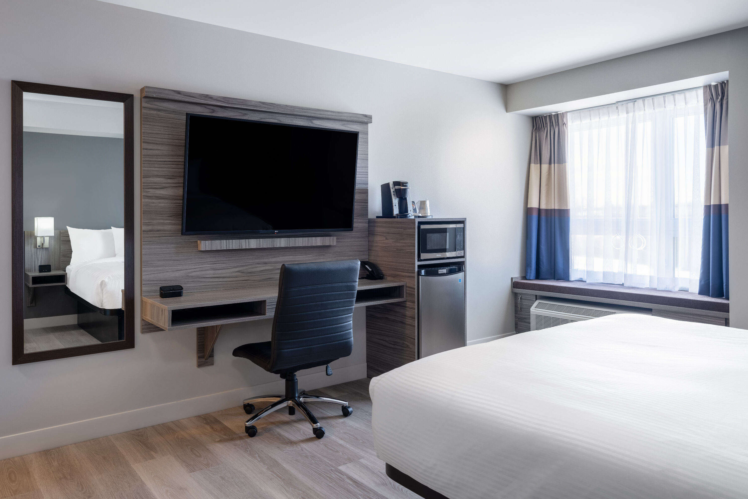 Guest room at the Microtel Inn & Suites by Wyndham Kanata Ottawa West in Kanata, Ontario