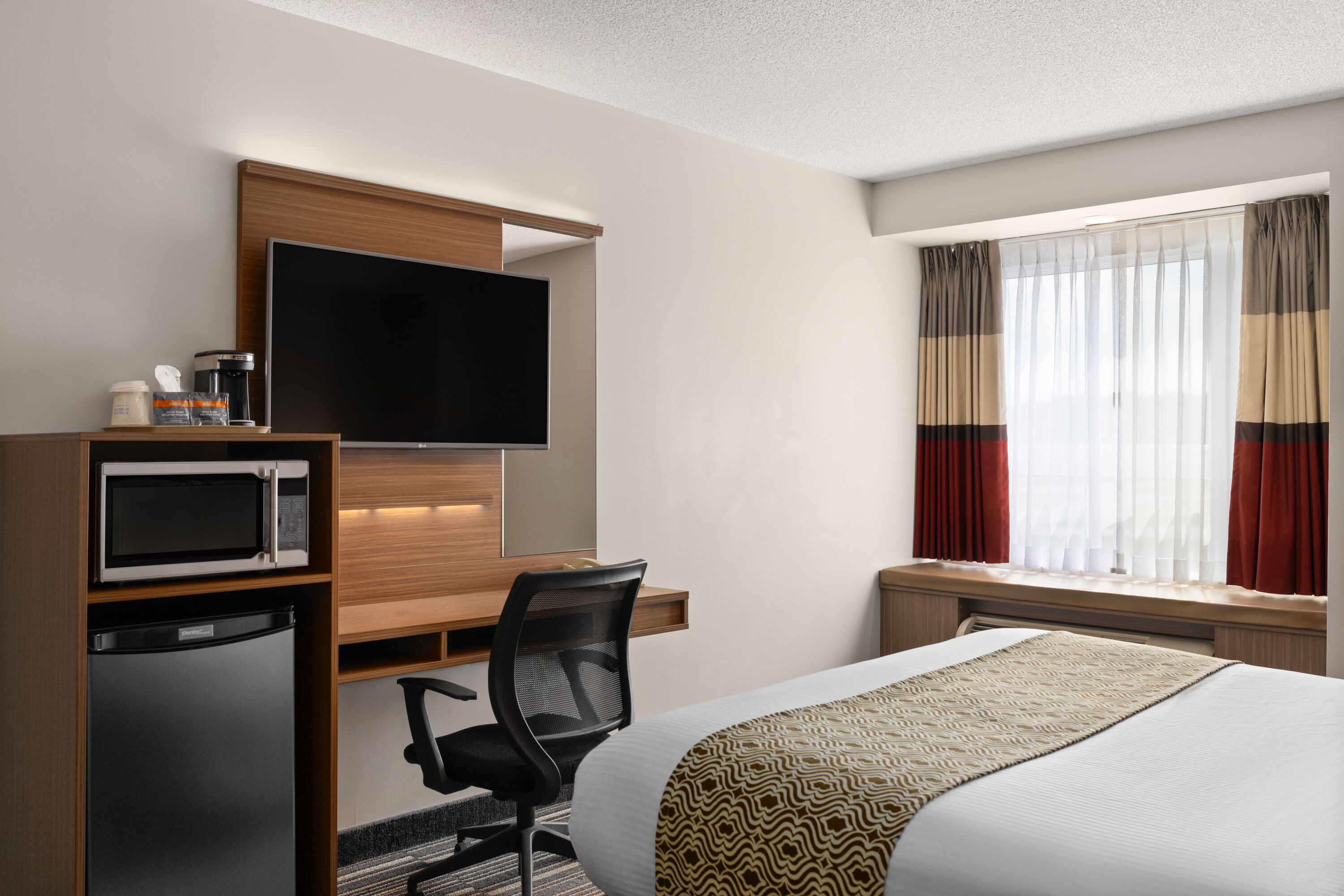 Guest room at the Microtel Inn & Suites by Wyndham Kirkland Lake in Kirkland Lake, Ontario