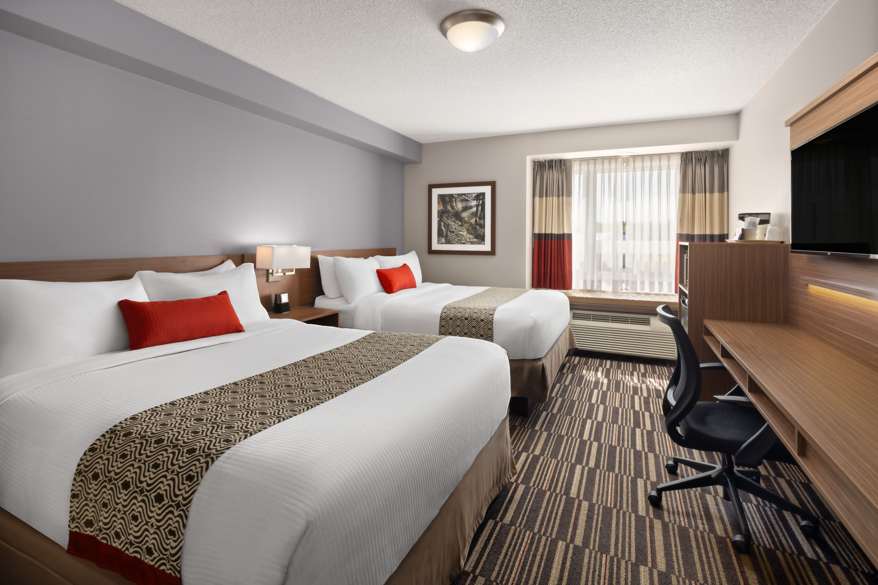 Guest room at the Microtel Inn & Suites by Wyndham Kirkland Lake in Kirkland Lake, Ontario
