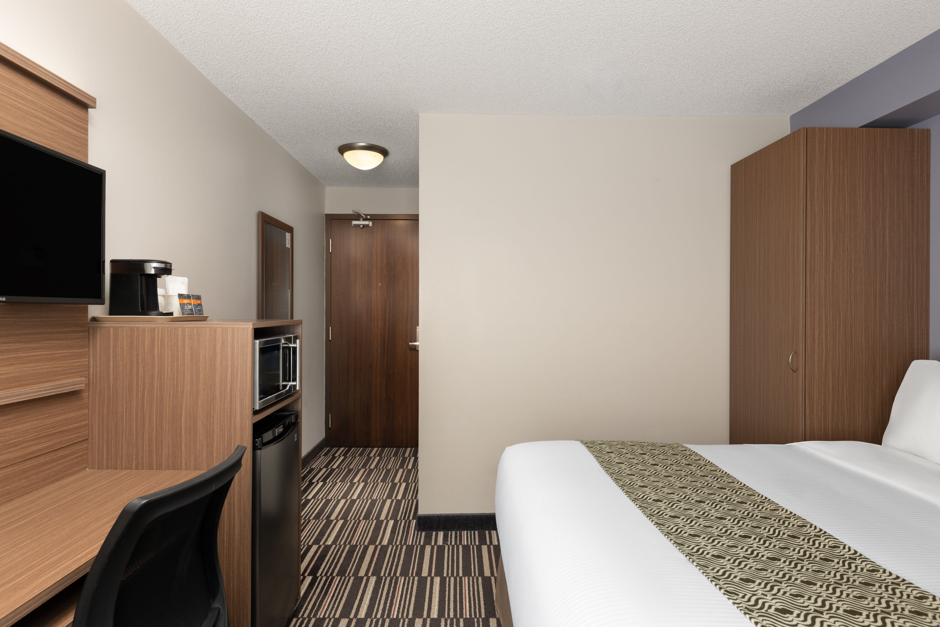 Guest room at the Microtel Inn & Suites by Wyndham Kirkland Lake in Kirkland Lake, Ontario