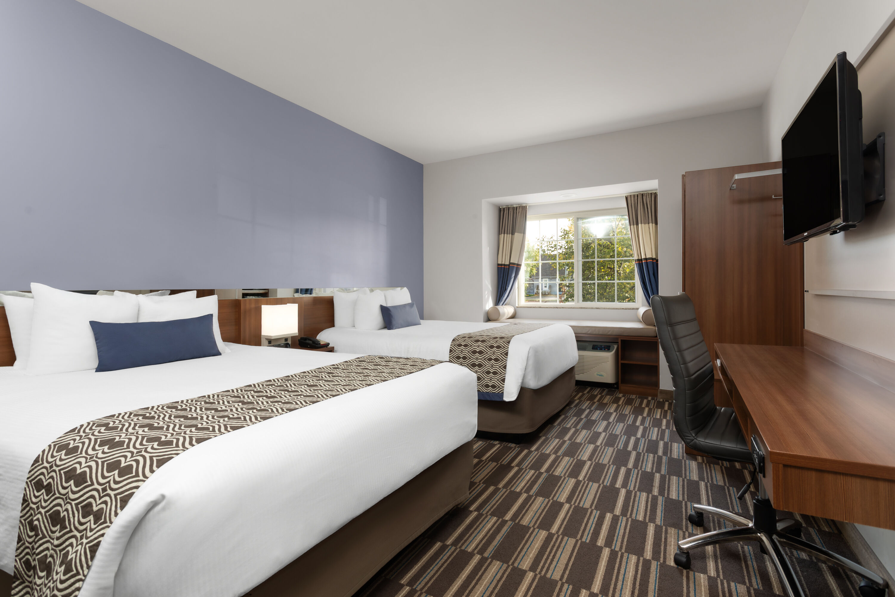 Guest room at the Microtel Inn & Suites by Wyndham Sault Ste. Marie in Sault Sainte Marie, Ontario