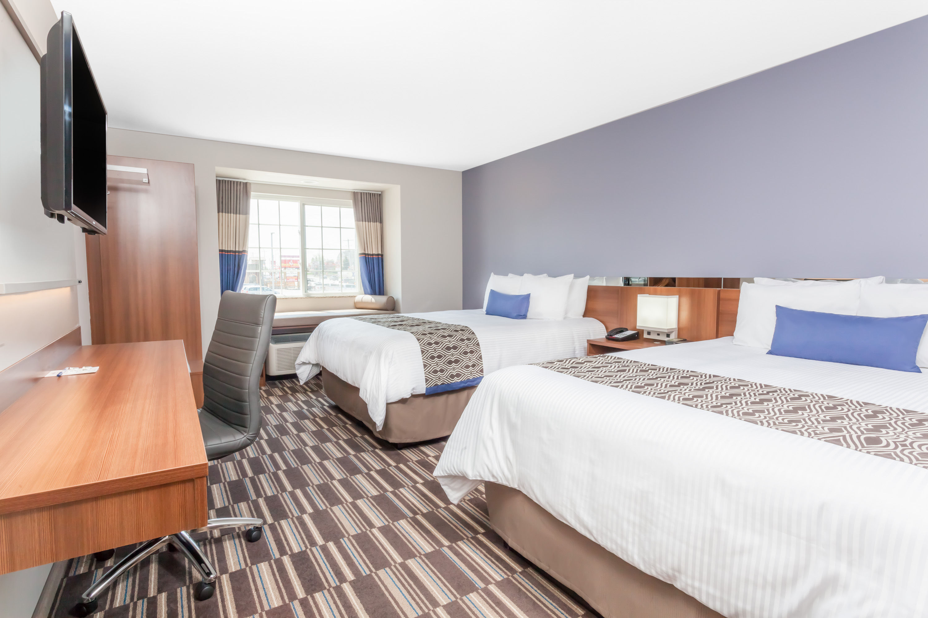 Guest room at the Microtel Inn & Suites by Wyndham Sault Ste. Marie in Sault Sainte Marie, Ontario