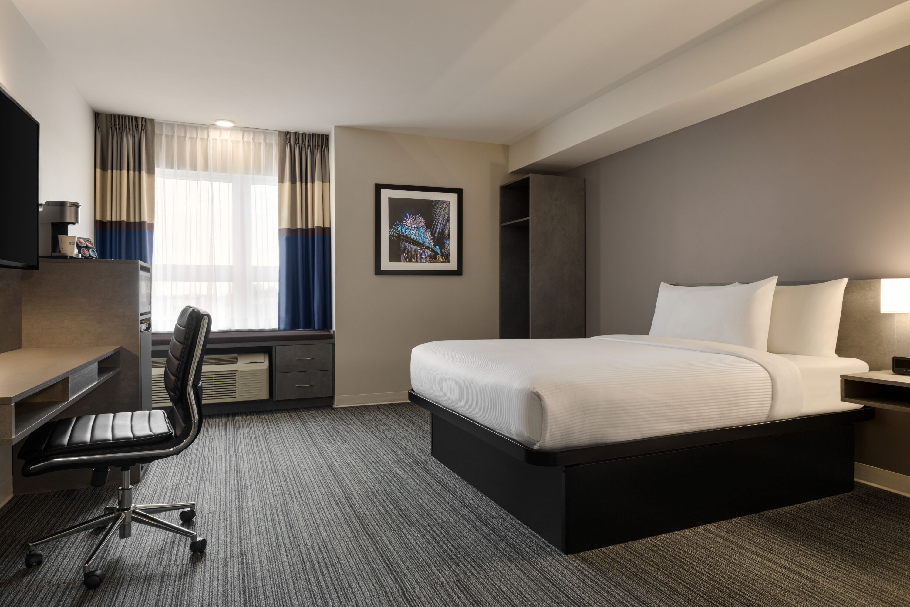 Guest room at the Microtel Inn & Suites by Wyndham Boisbriand in Boisbriand, Quebec