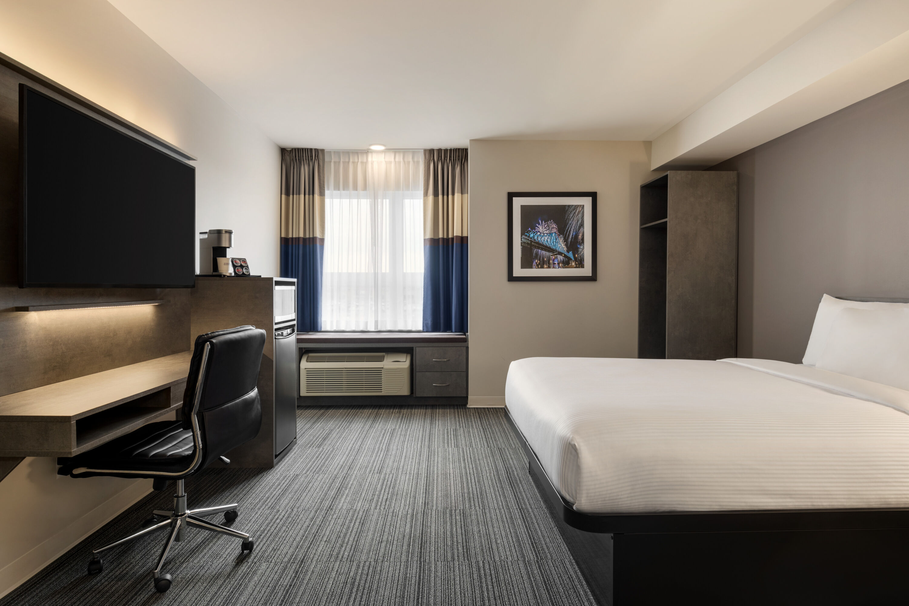 Guest room at the Microtel Inn & Suites by Wyndham Boisbriand in Boisbriand, Quebec