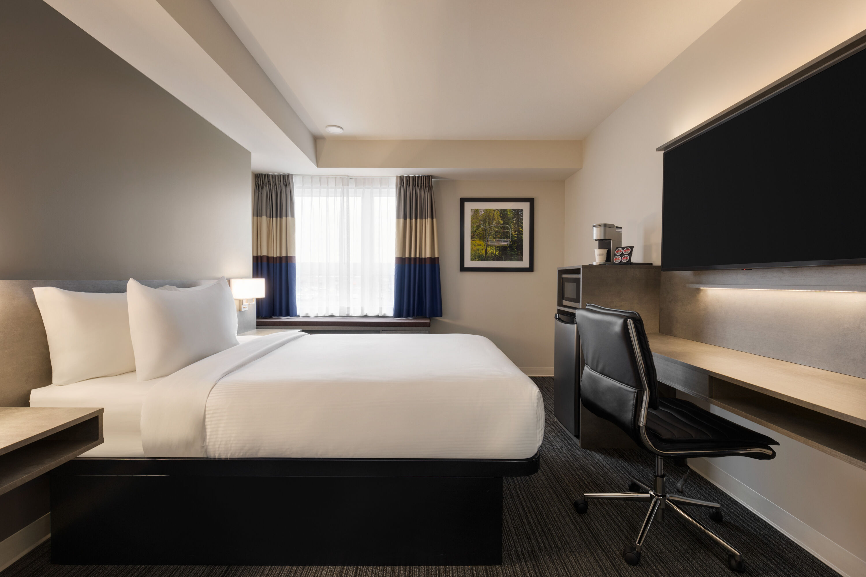 Guest room at the Microtel Inn & Suites by Wyndham Boisbriand in Boisbriand, Quebec