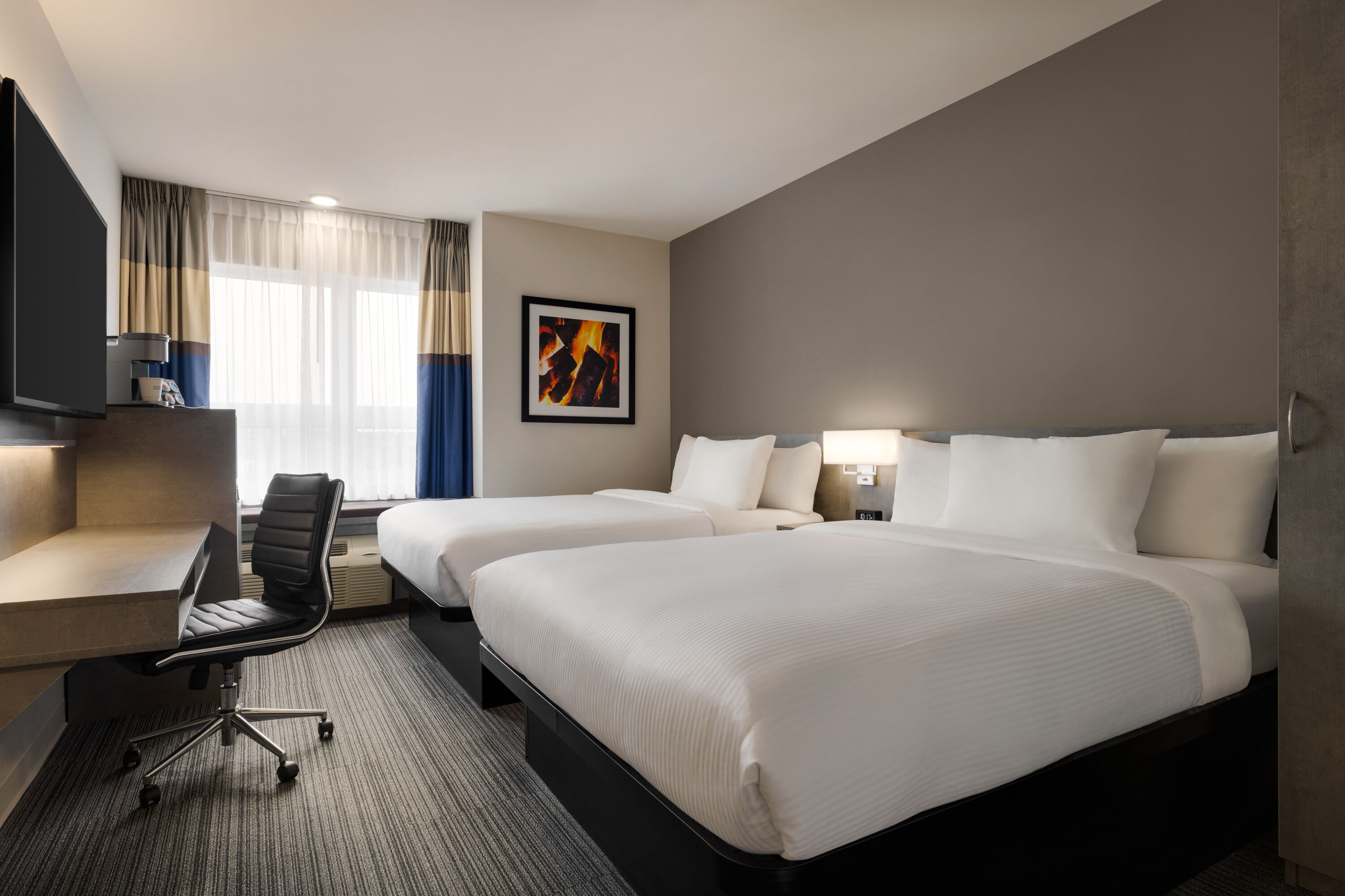 Guest room at the Microtel Inn & Suites by Wyndham Boisbriand in Boisbriand, Quebec