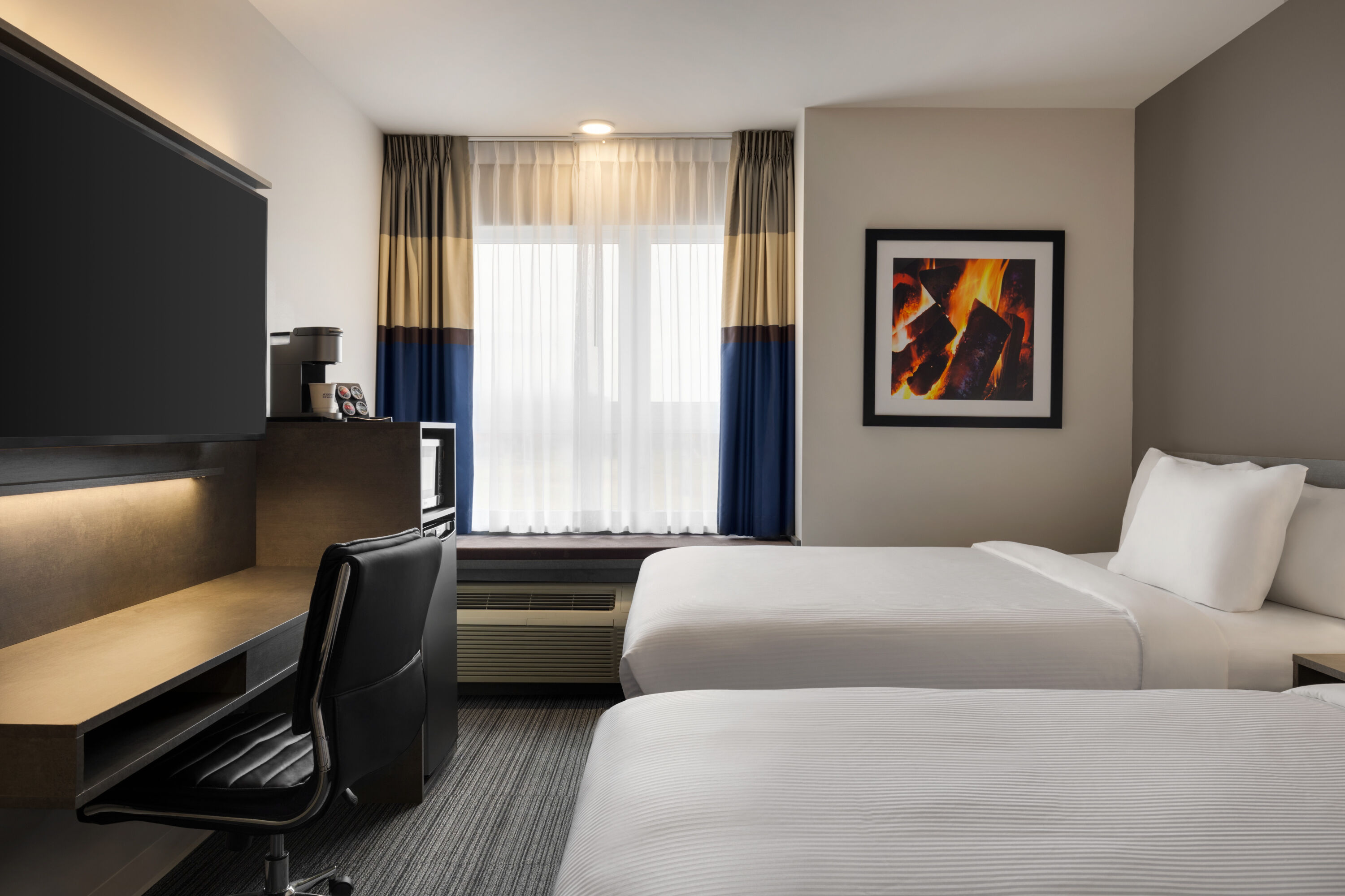 Guest room at the Microtel Inn & Suites by Wyndham Boisbriand in Boisbriand, Quebec