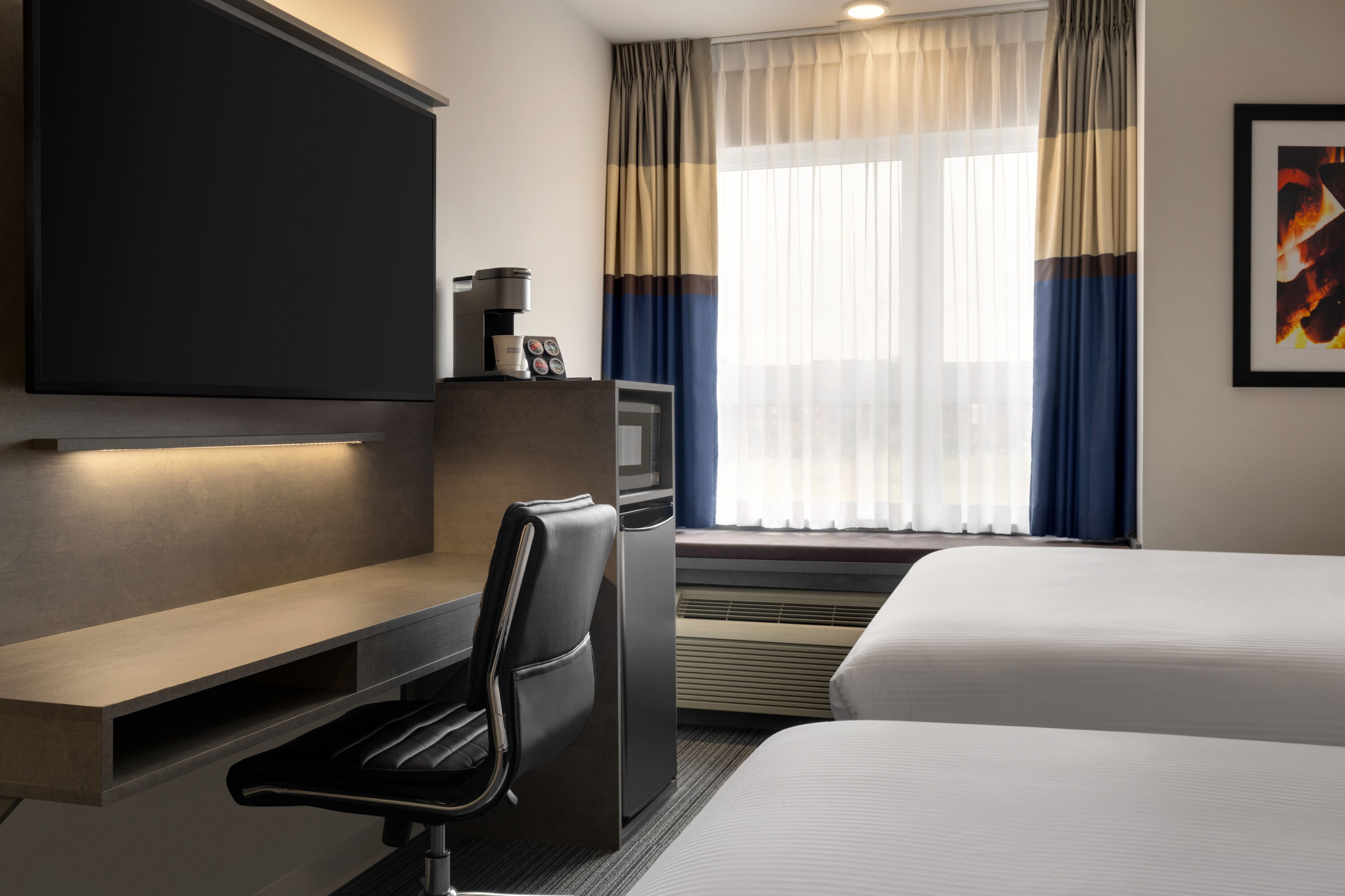 Guest room at the Microtel Inn & Suites by Wyndham Boisbriand in Boisbriand, Quebec