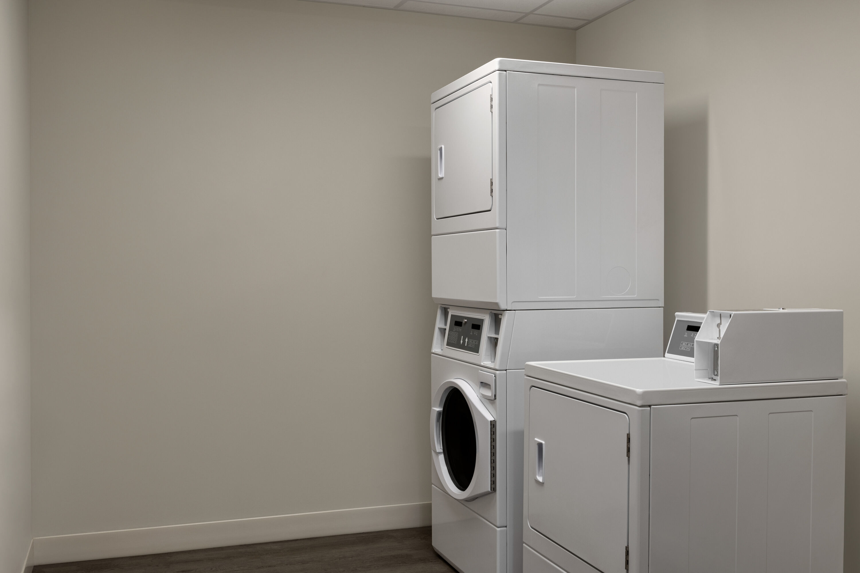 Laundry facilities at Microtel Inn & Suites by Wyndham Boisbriand in Boisbriand, Quebec