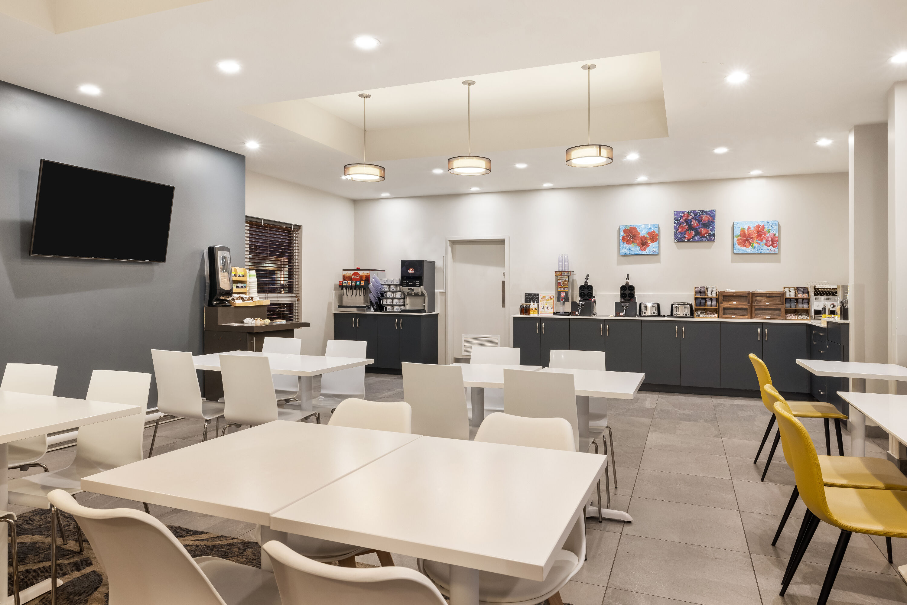 Microtel Inn & Suites by Wyndham Mont Tremblant restaurant breakfast area with seating in Mont-Tremblant, Quebec