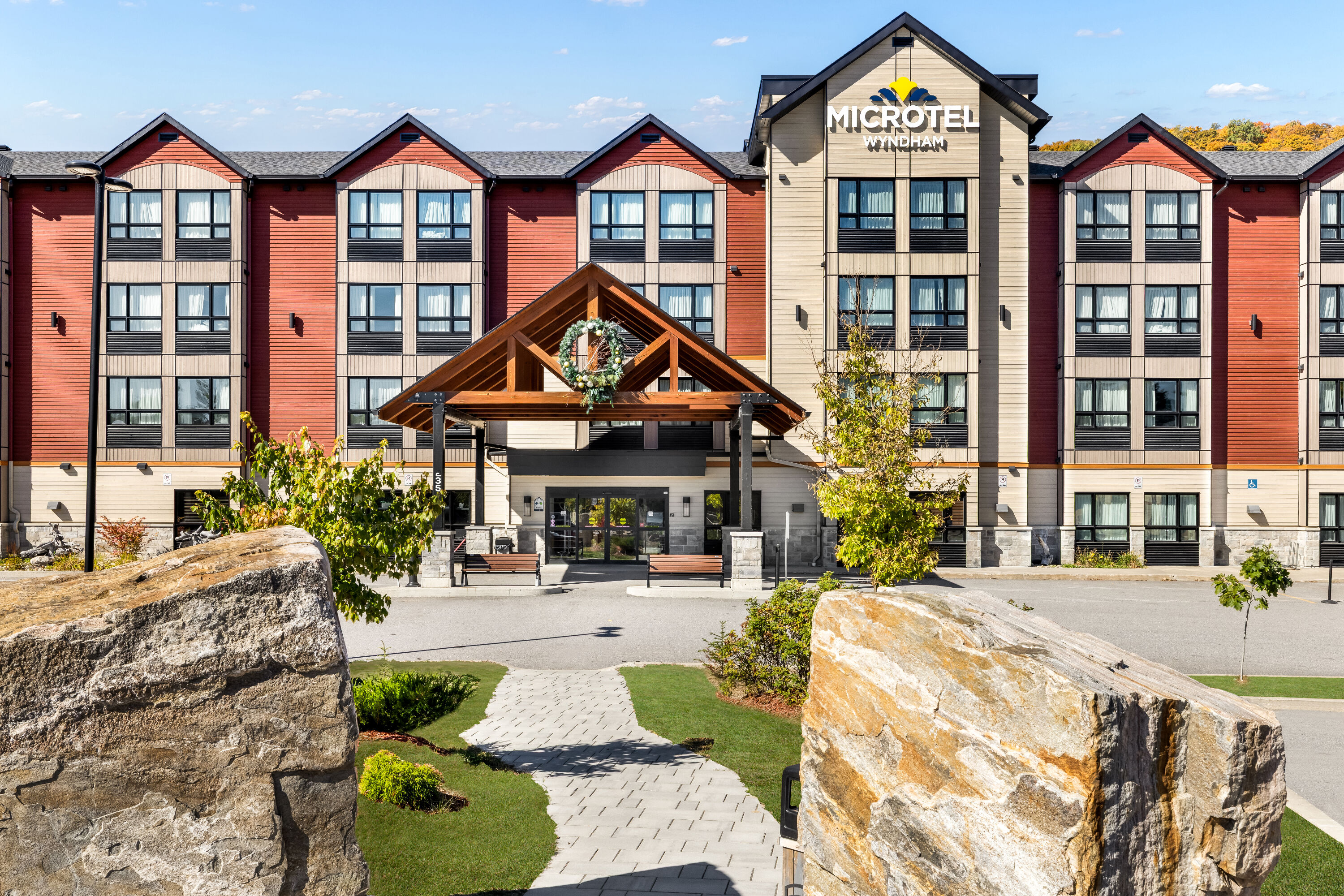 Exterior Day Image of Microtel Inn & Suites by Wyndham Mont Tremblant hotel in Mont-Tremblant, Quebec