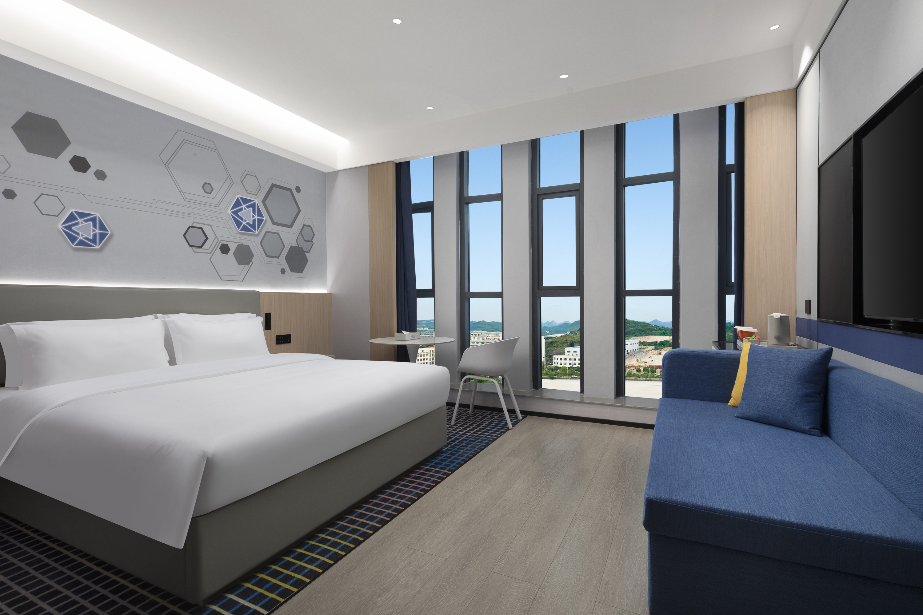 Guest room at the Microtel by Wyndham Anshun Xixiu in Anshun, Other than US/Canada