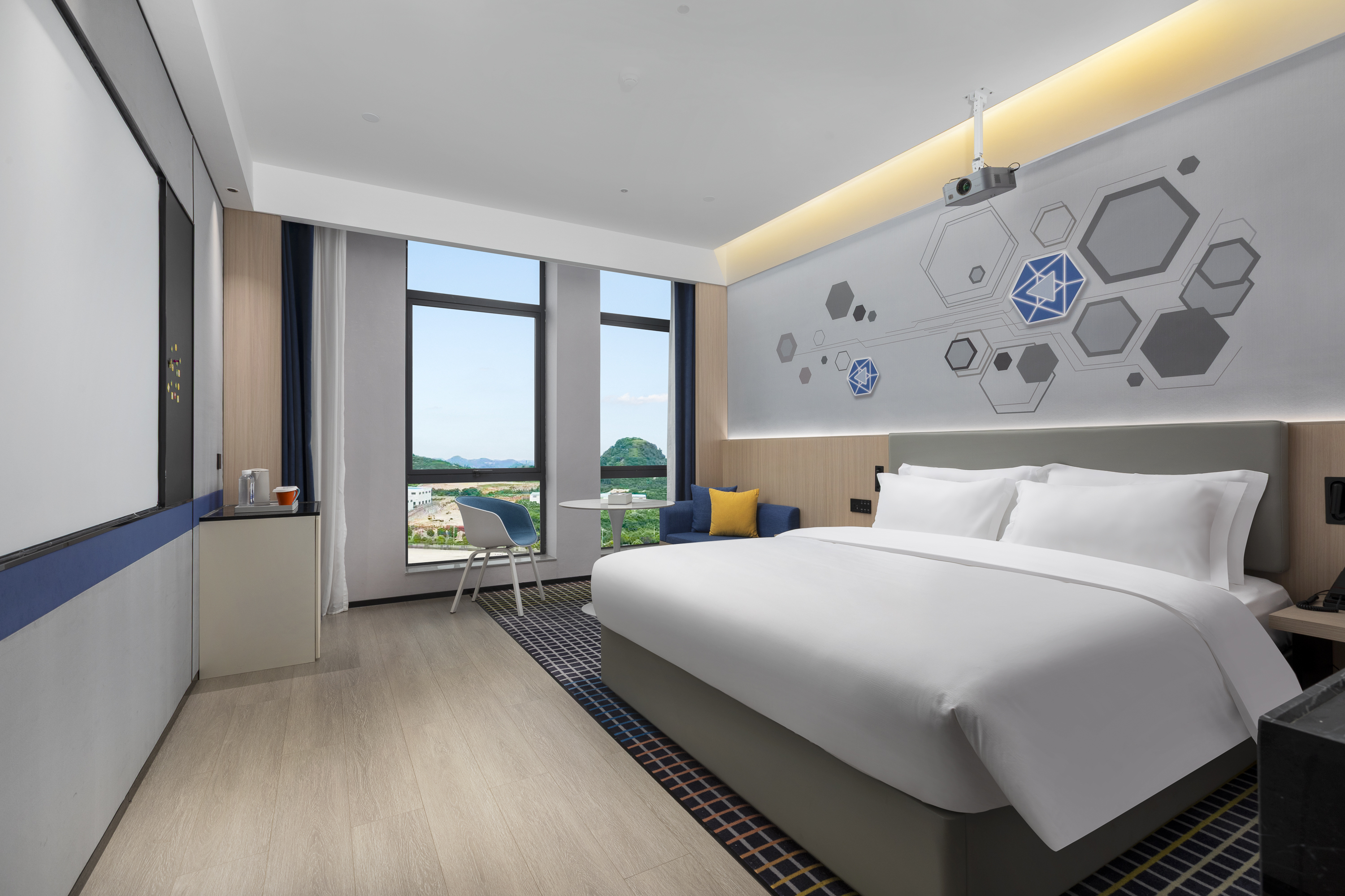 Guest room at the Microtel by Wyndham Anshun Xixiu in Anshun, Other than US/Canada