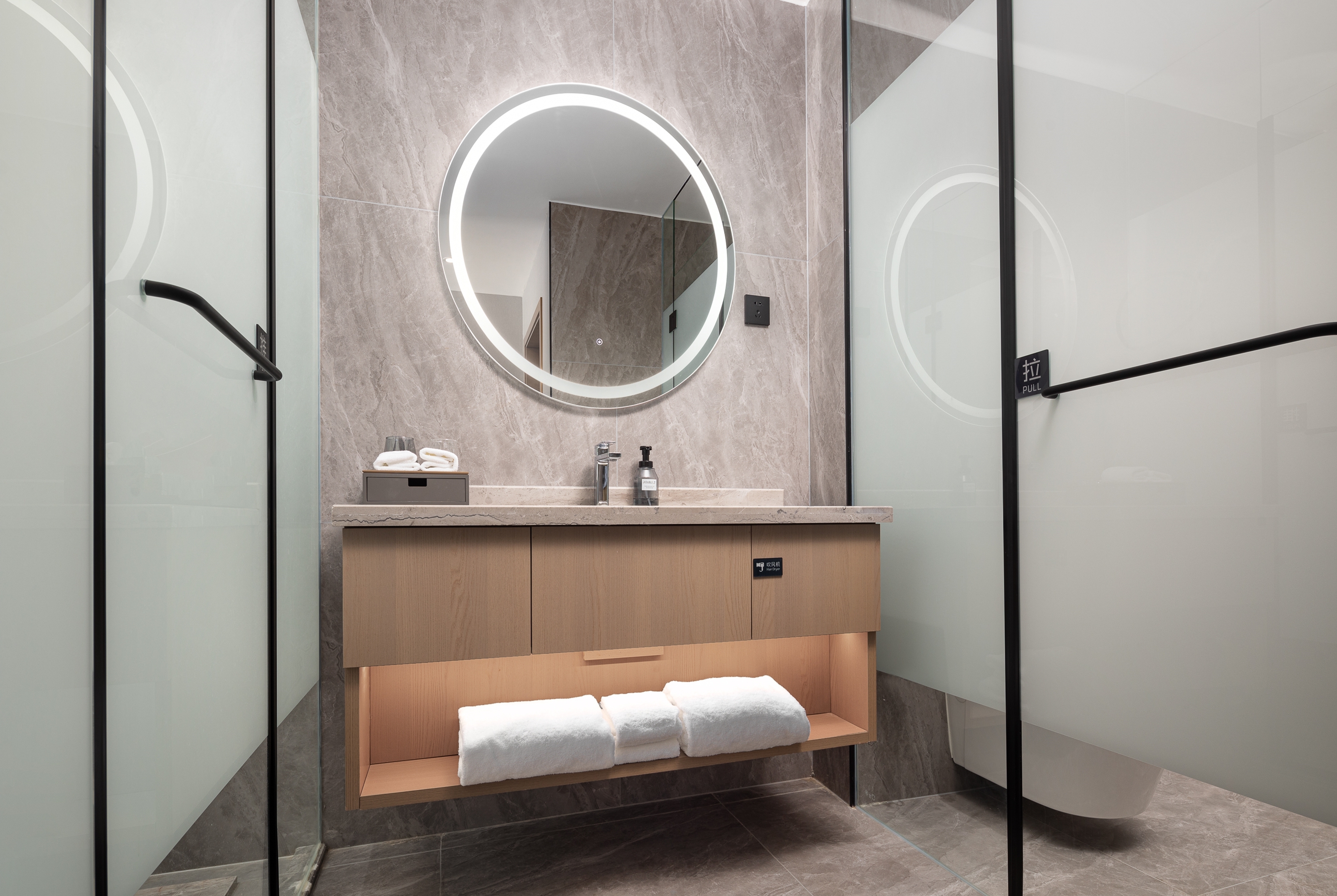 Guest room bath at the Microtel by Wyndham Changsha Meixi Lake in Changsha, Other than US/Canada