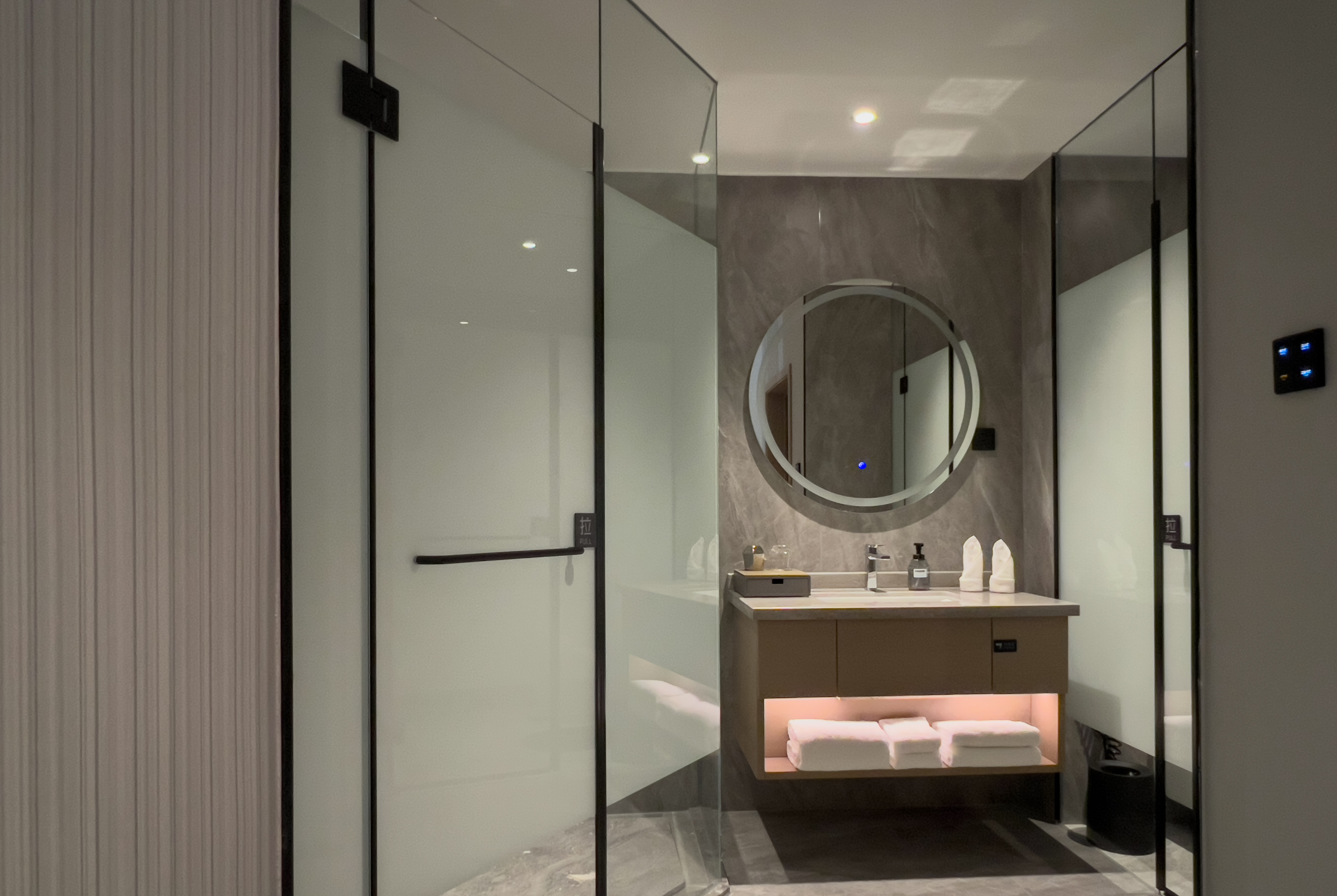 Guest room bath at the Microtel by Wyndham Changsha Meixi Lake in Changsha, Other than US/Canada