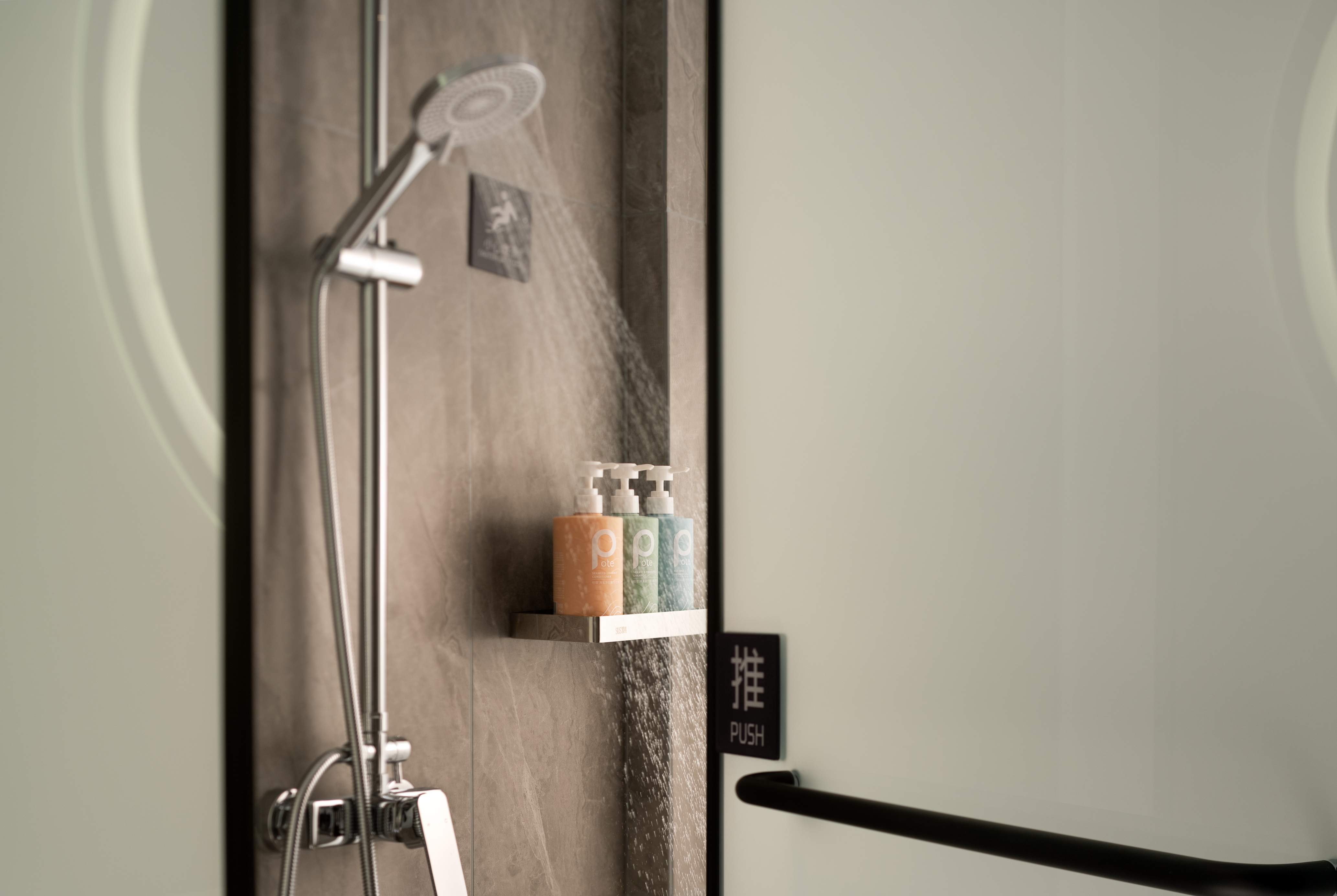 Guest room bath at the Microtel by Wyndham Changsha Meixi Lake in Changsha, Other than US/Canada