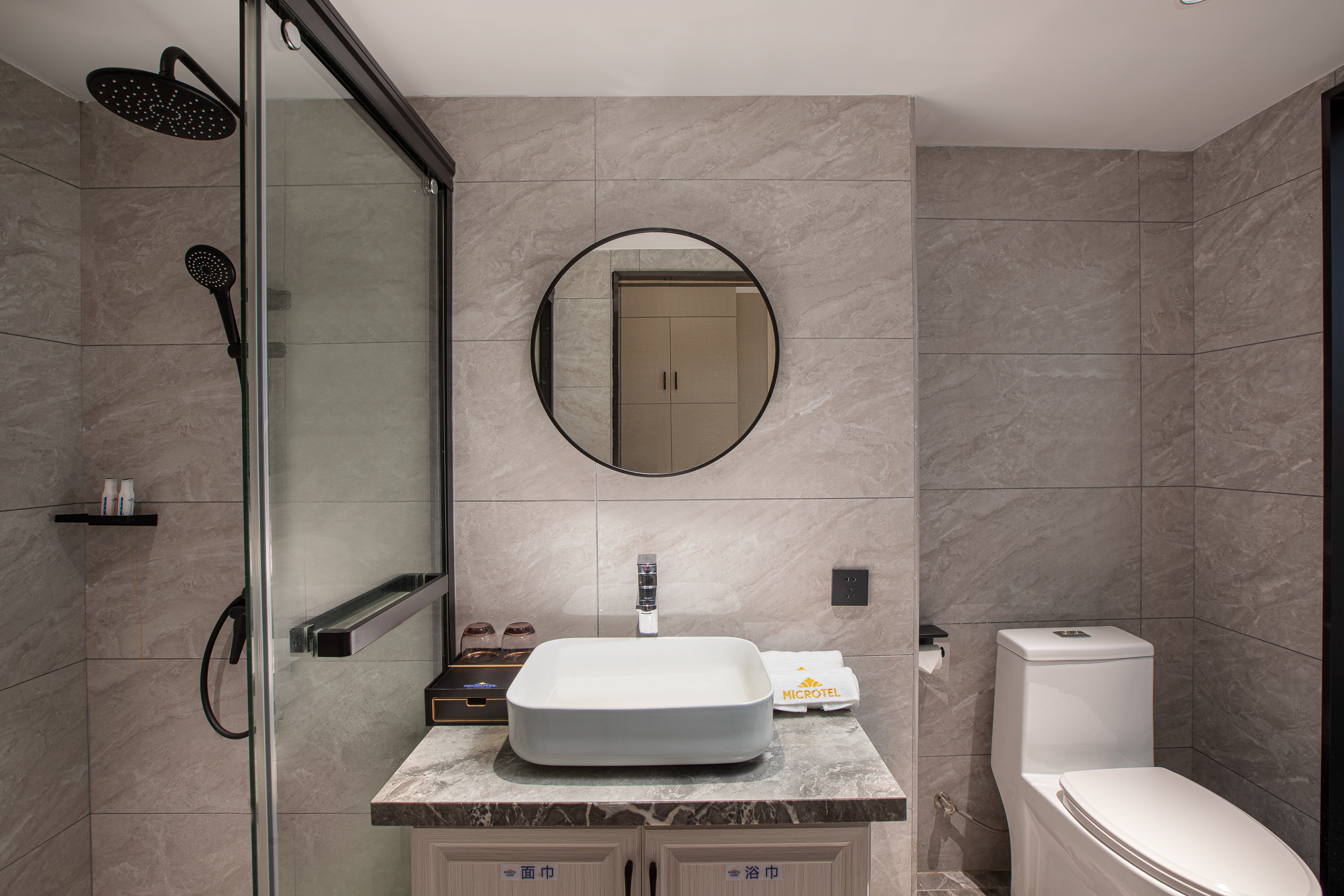 Guest room bath at the Microtel By Wyndham Heyuan in Heyuan, Other than US/Canada