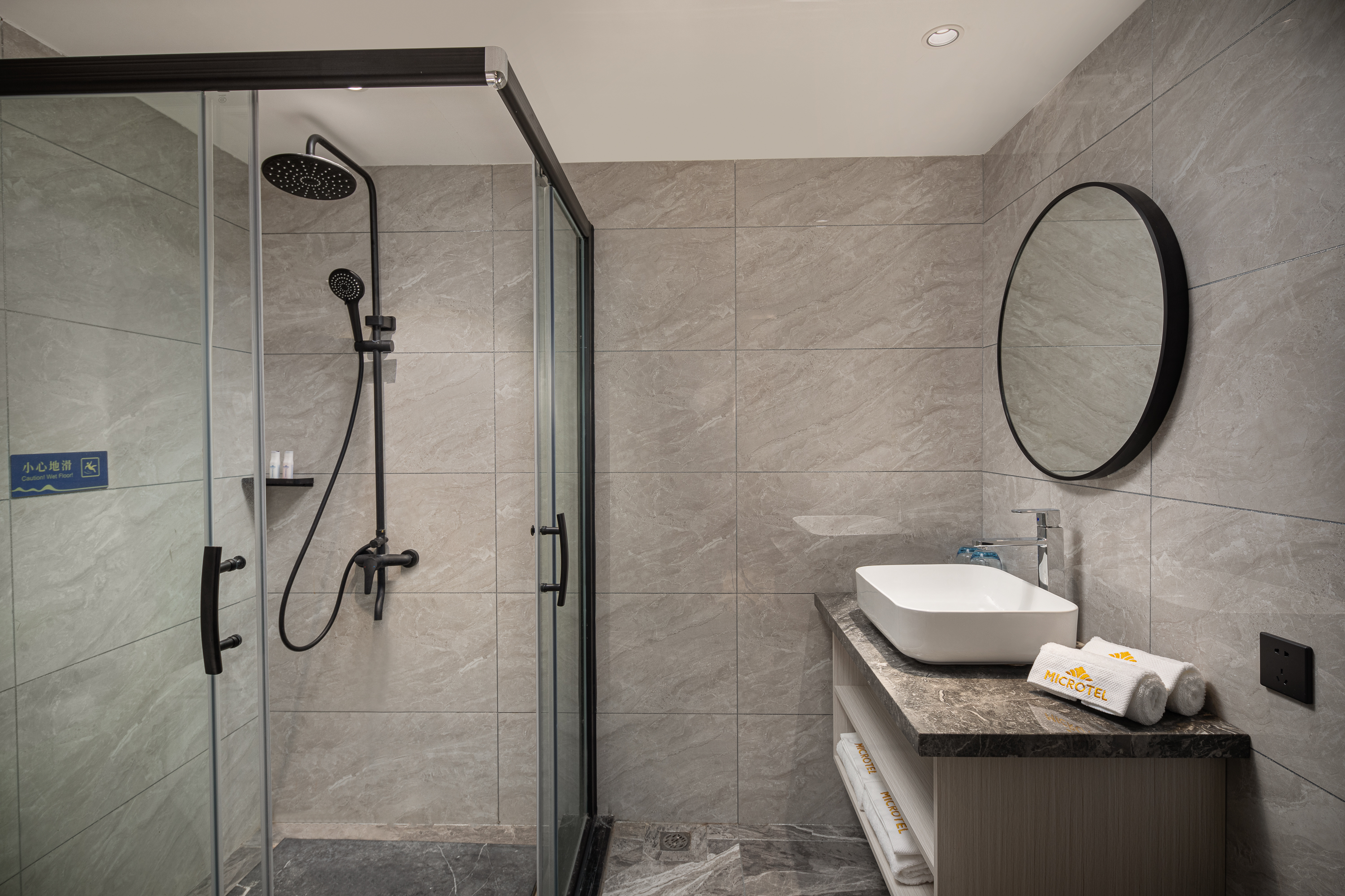 Guest room bath at the Microtel By Wyndham Heyuan in Heyuan, Other than US/Canada