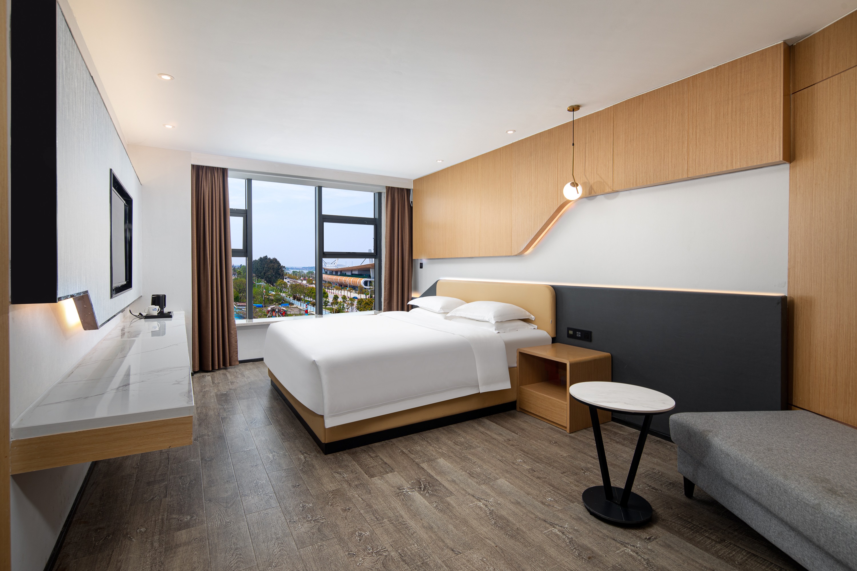 Guest room at the Microtel by Wyndham Miluo Downtown in Miluo, Other than US/Canada