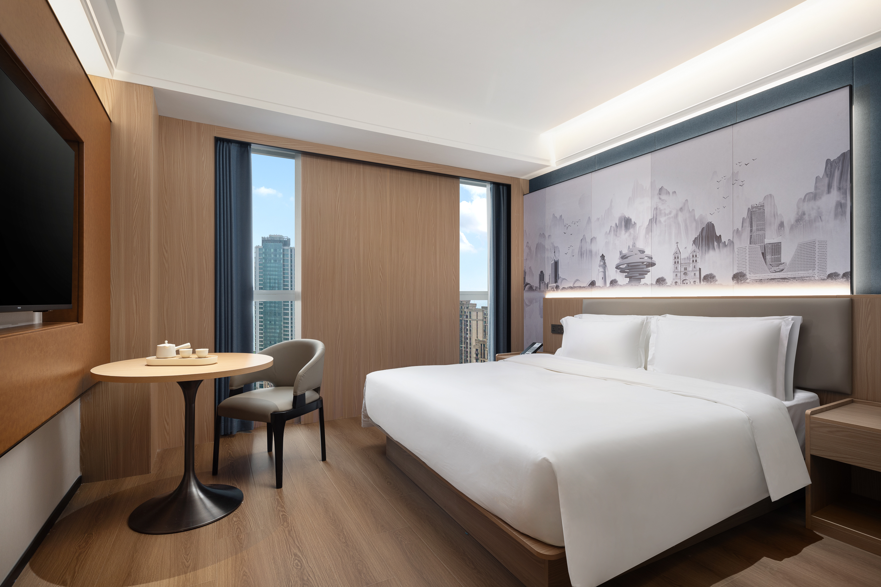 Guest room at the Microtel by Wyndham Qingdao Huangdao in Qingdao, Other than US/Canada