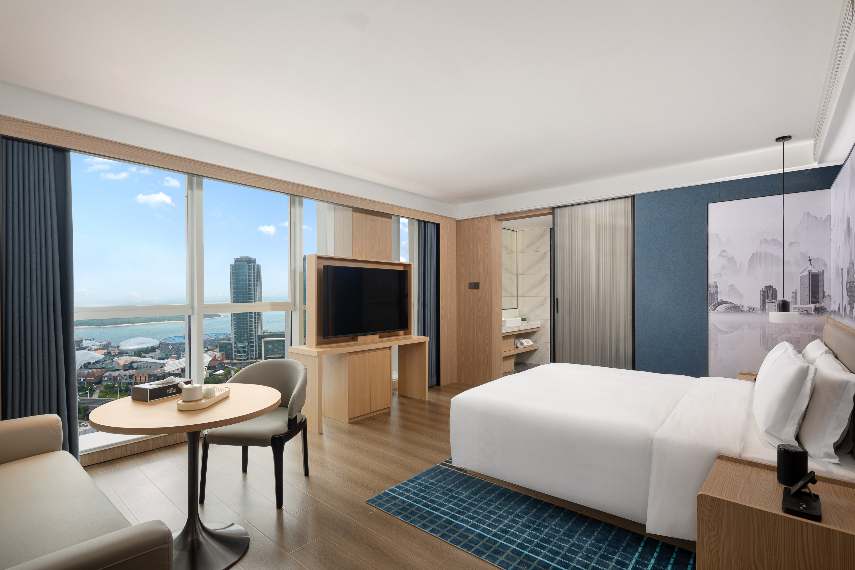 Guest room at the Microtel by Wyndham Qingdao Huangdao in Qingdao, Other than US/Canada