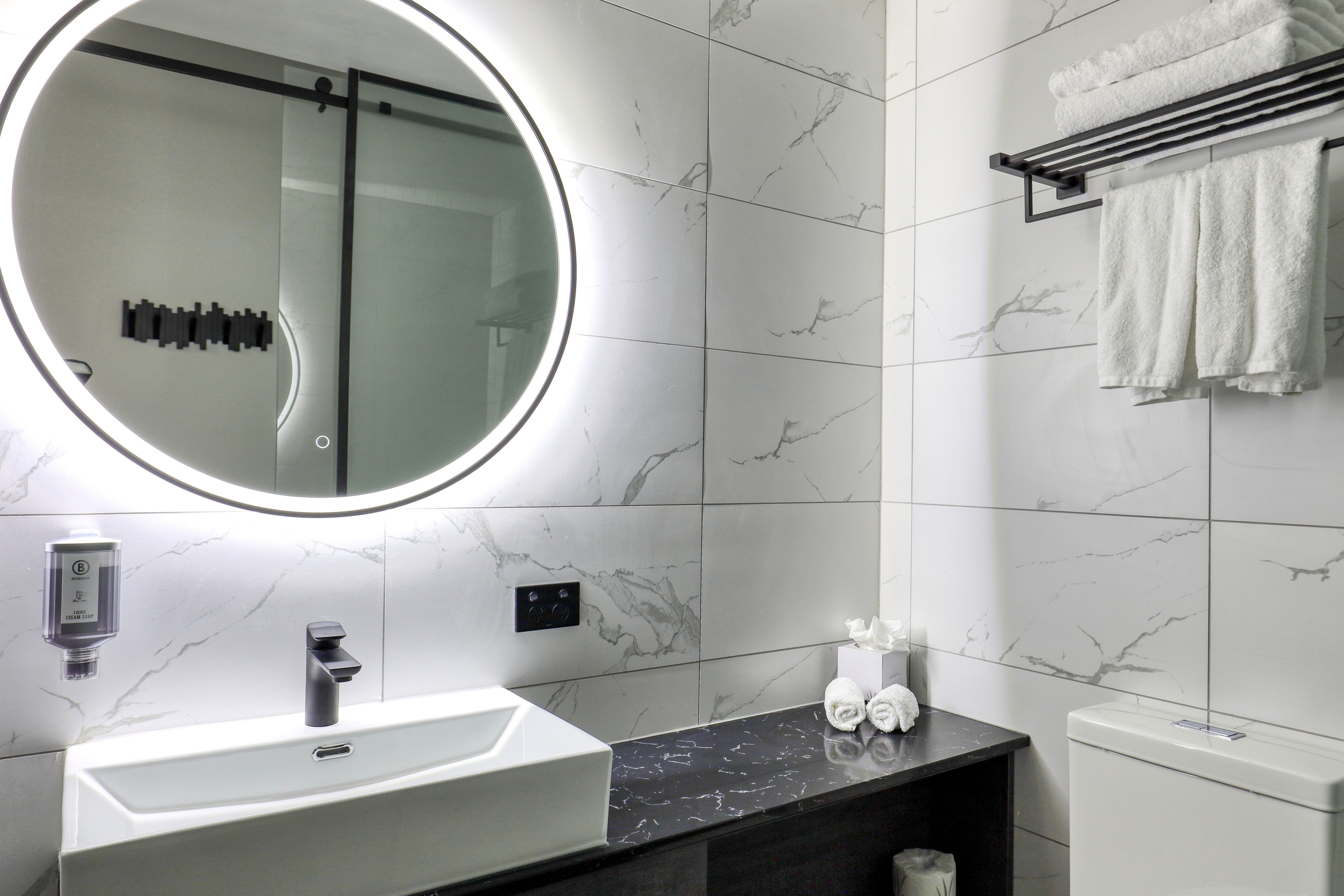 Guest room bath at the Microtel by Wyndham Wellington in Wellington, Other than US/Canada