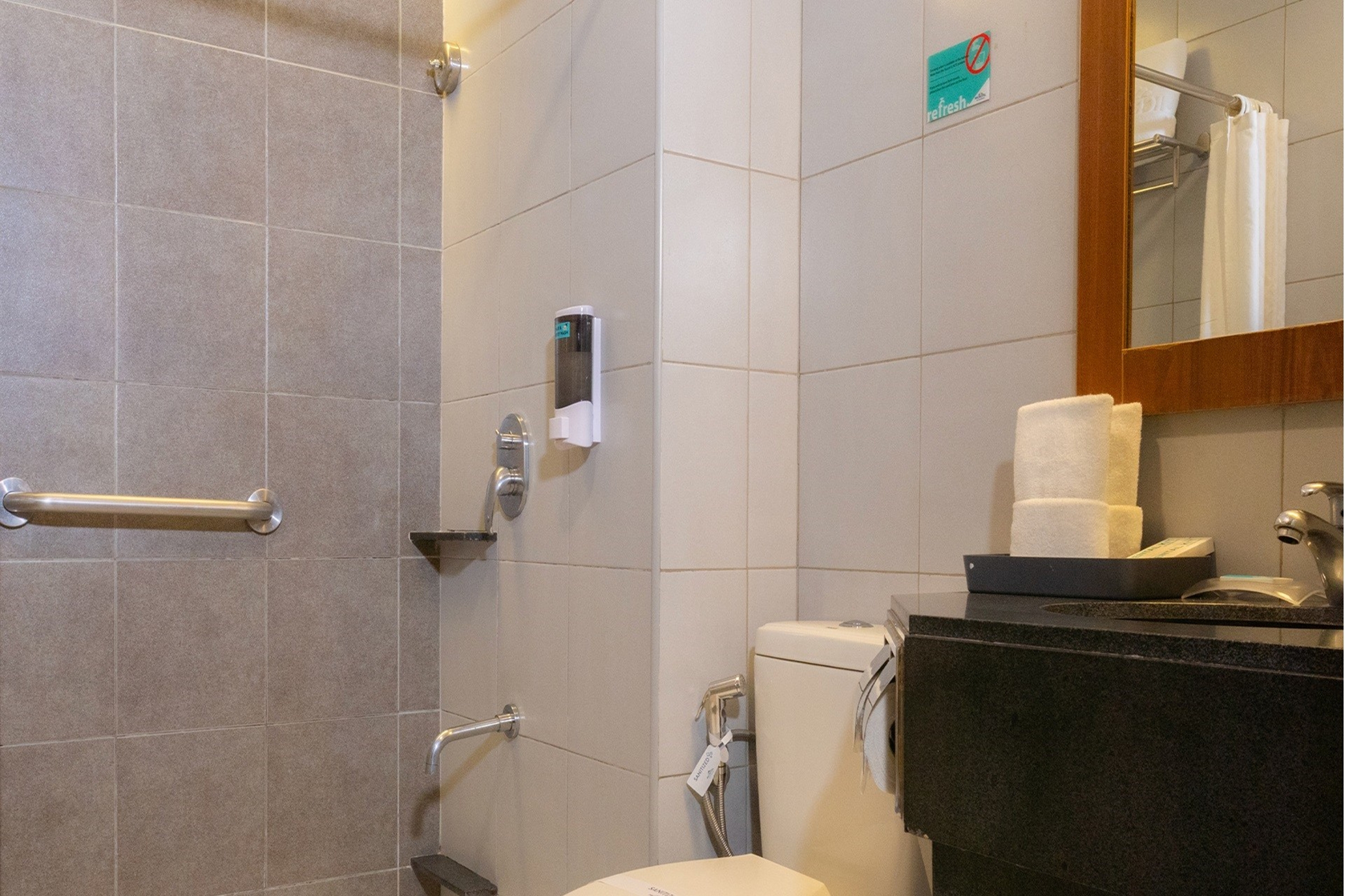 Guest room bath at the Microtel by Wyndham UP Technohub in Quezon City, Other than US/Canada