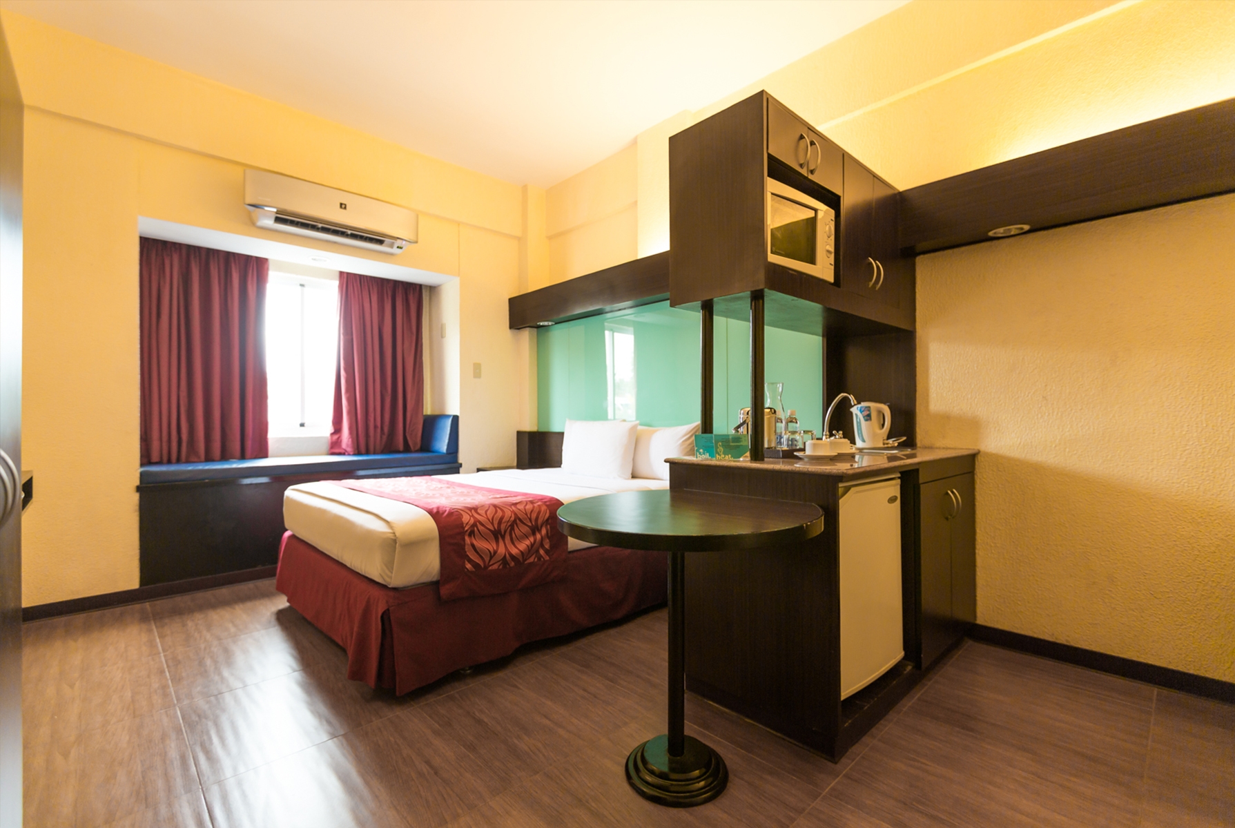 Guest room at the Microtel by Wyndham Batangas in Batangas, Other than US/Canada