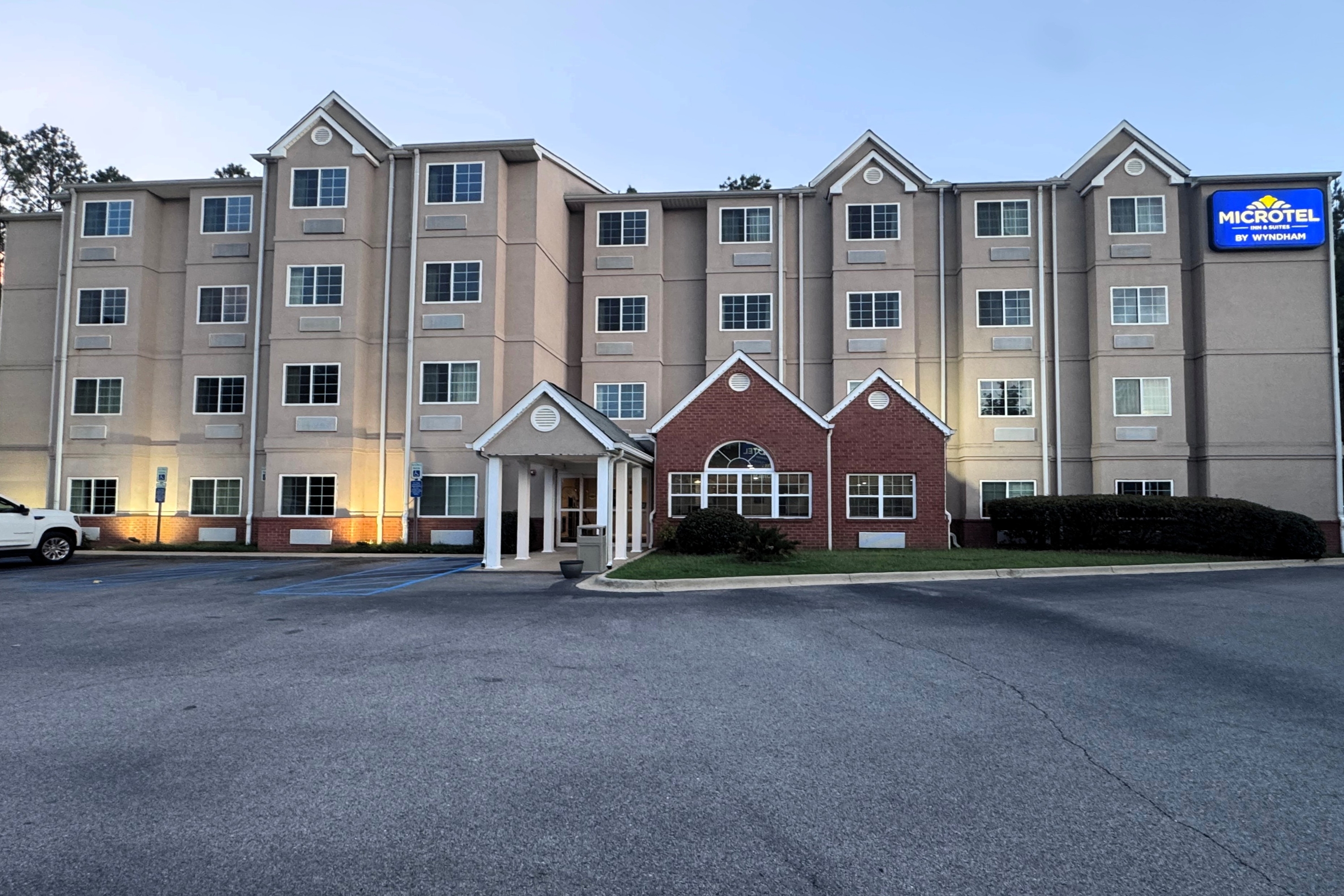 Exterior Dusk Image of Microtel Inn & Suites by Wyndham Hoover/Birmingham hotel in Hoover, Alabama