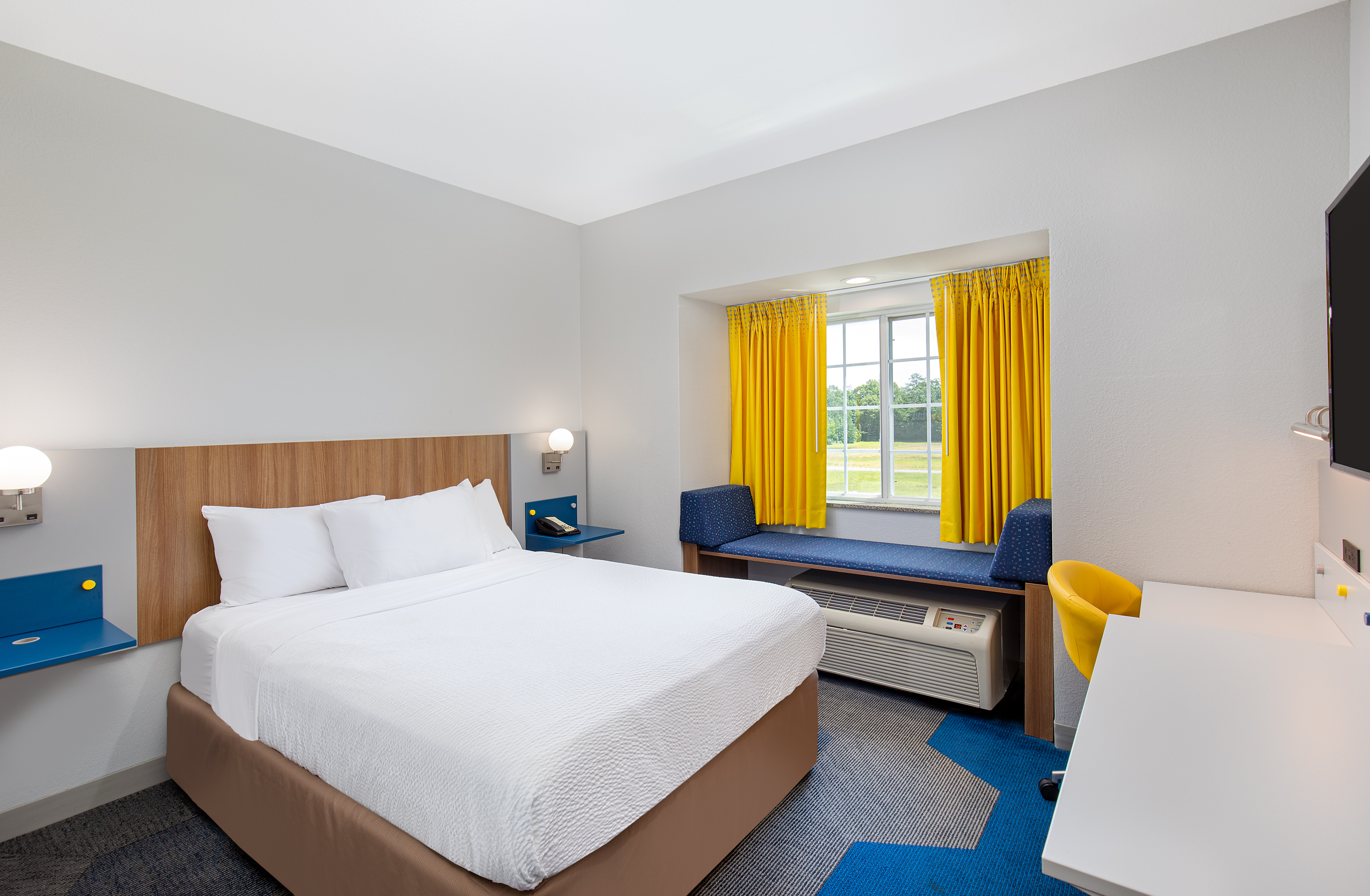 Guest room at the Microtel Inn & Suites by Wyndham Opelika in Opelika, Alabama