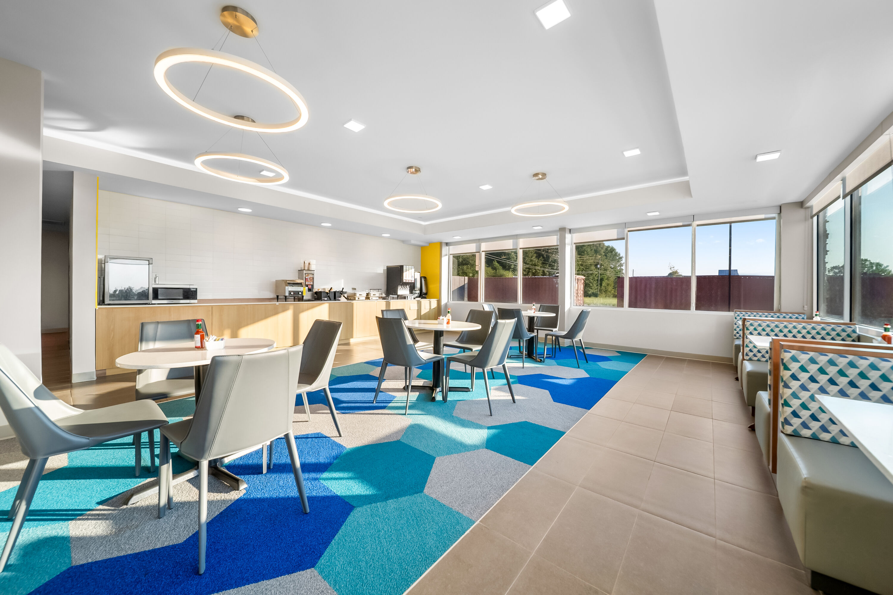 Microtel Inn & Suites by Wyndham Prattville Montgomery restaurant breakfast area with seating in Prattville, Alabama