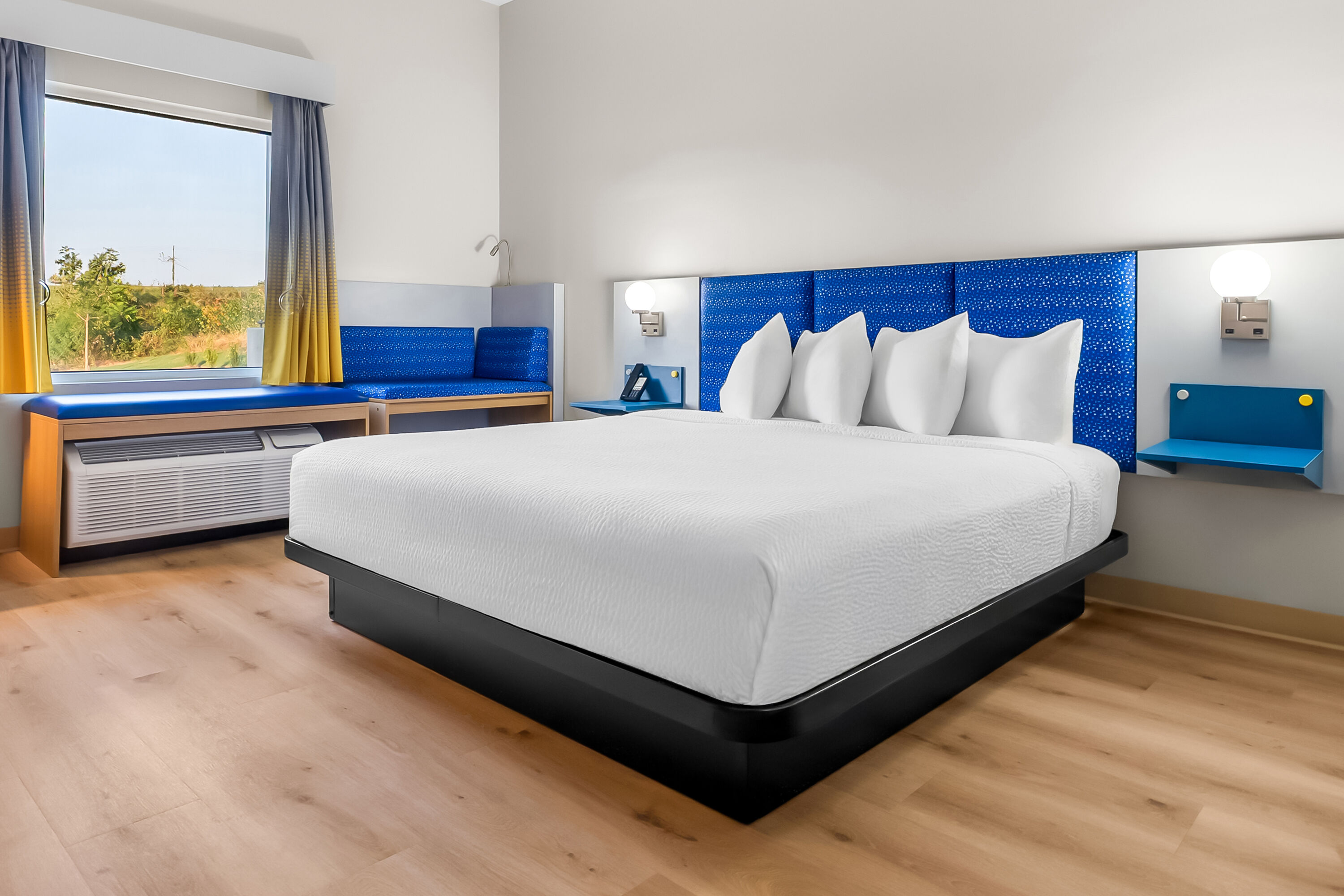 King bed guest room at the Microtel Inn & Suites by Wyndham Prattville Montgomery in Prattville, Alabama