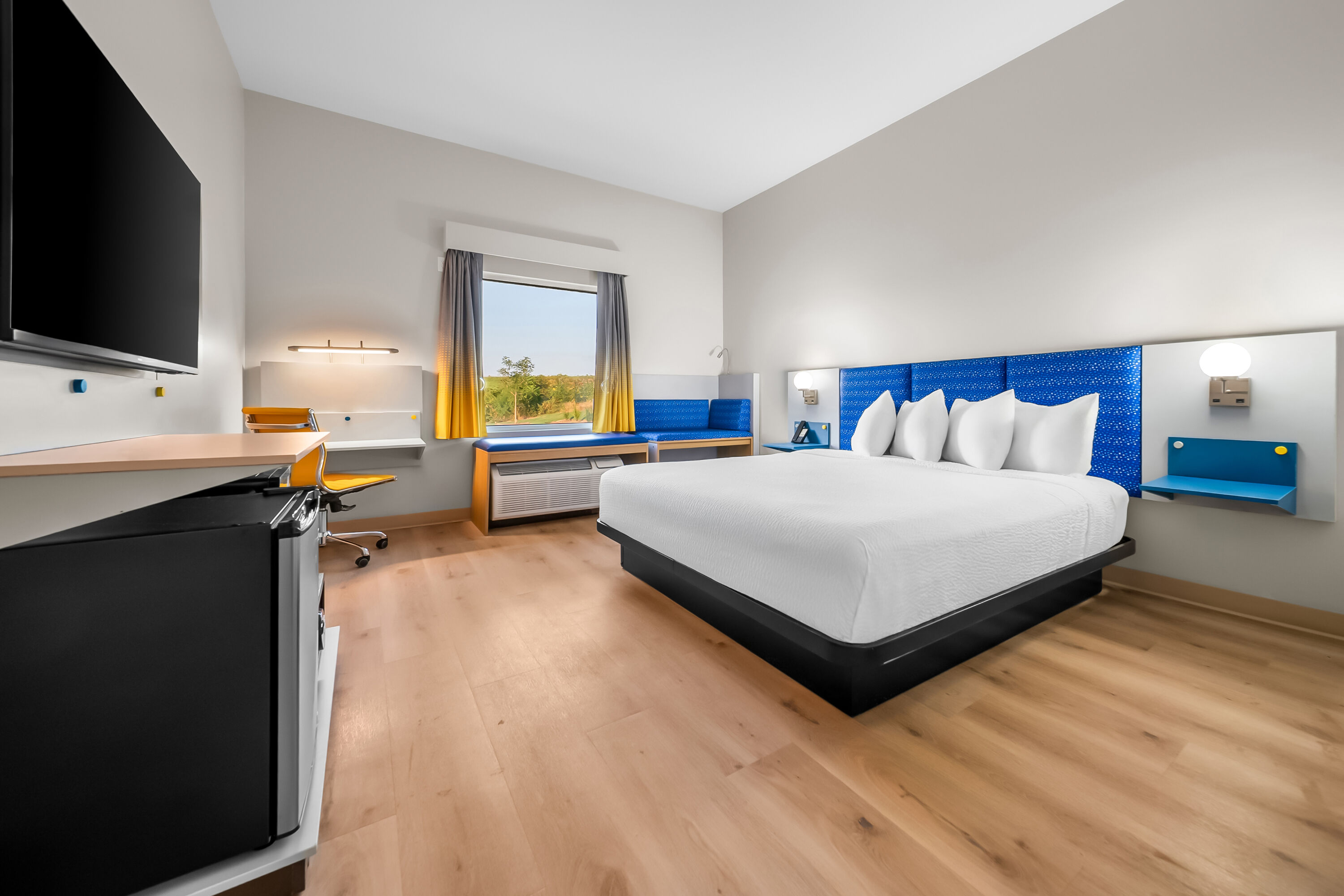 King bed guest room at the Microtel Inn & Suites by Wyndham Prattville Montgomery in Prattville, Alabama