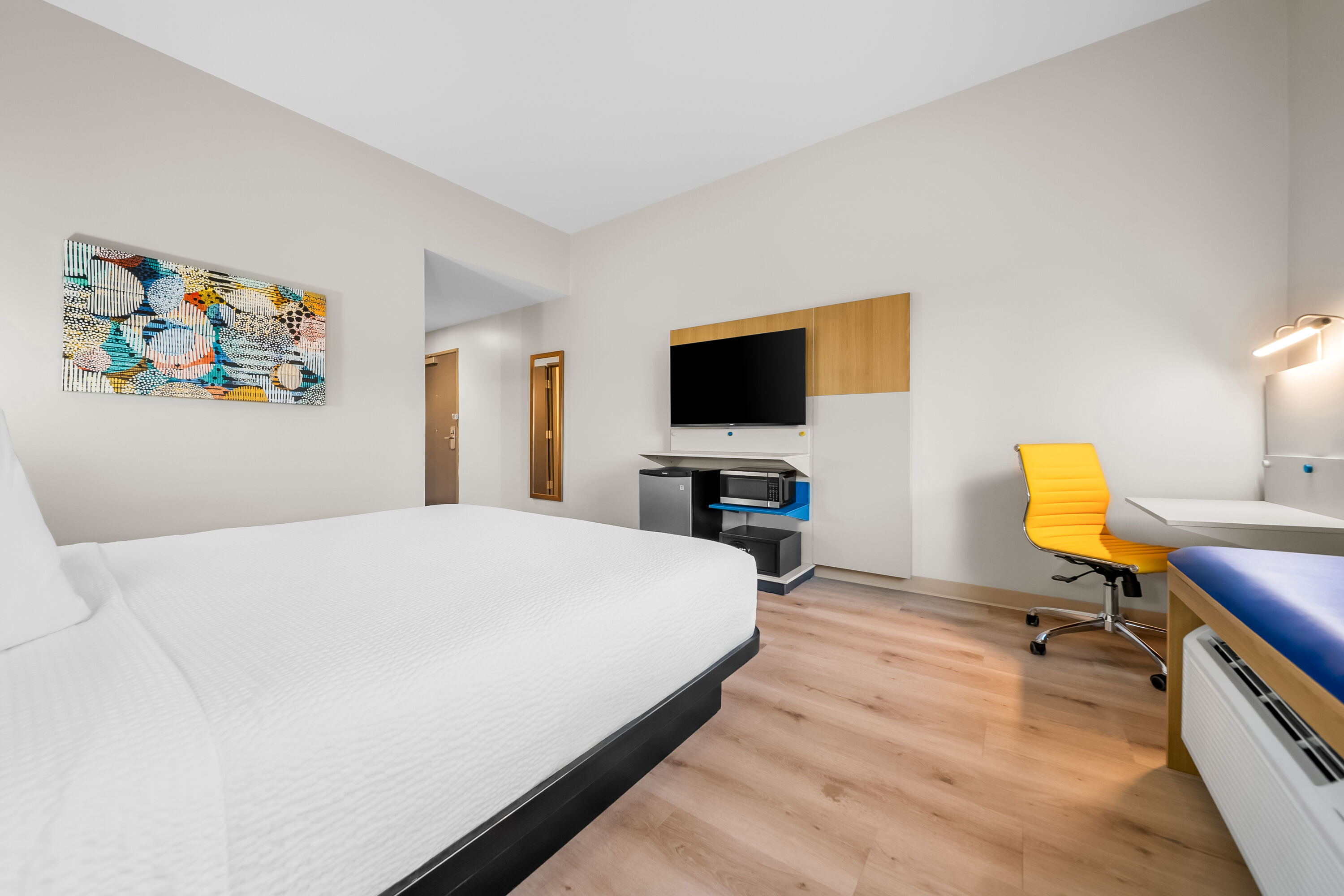 King bed guest room at the Microtel Inn & Suites by Wyndham Prattville Montgomery in Prattville, Alabama