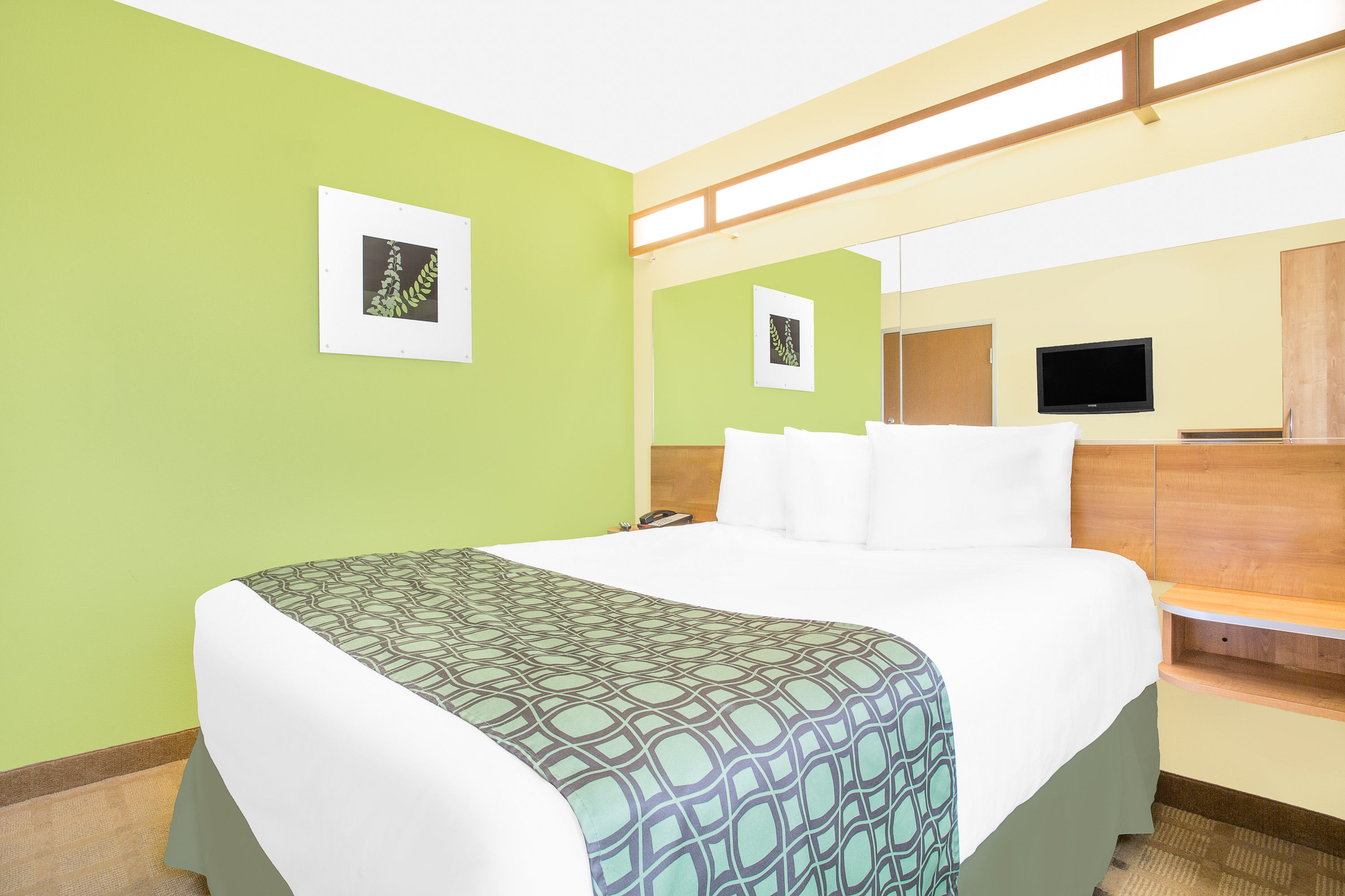 Guest room at the Microtel Inn & Suites by Wyndham Tuscumbia/Muscle Shoals in Tuscumbia, Alabama