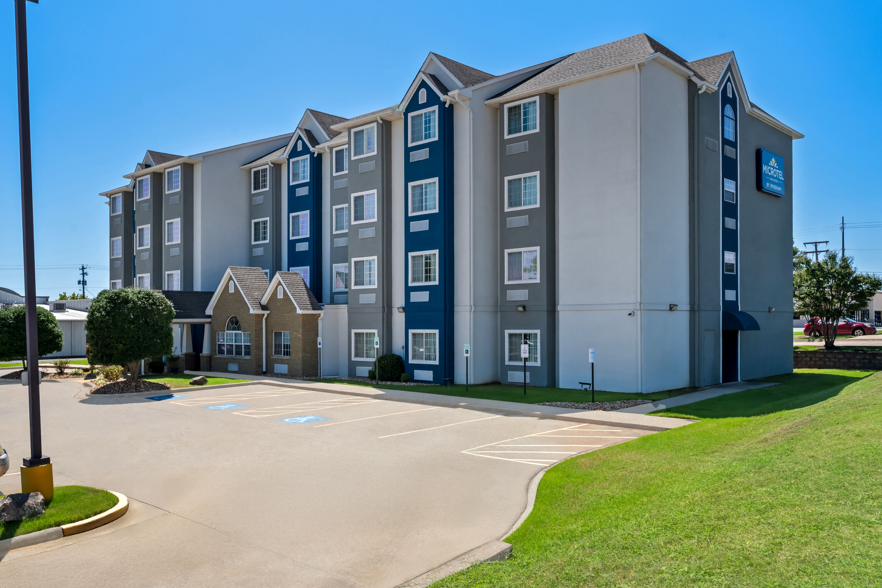 Exterior Day Image of Microtel Inn & Suites by Wyndham Conway hotel in Conway, Arkansas