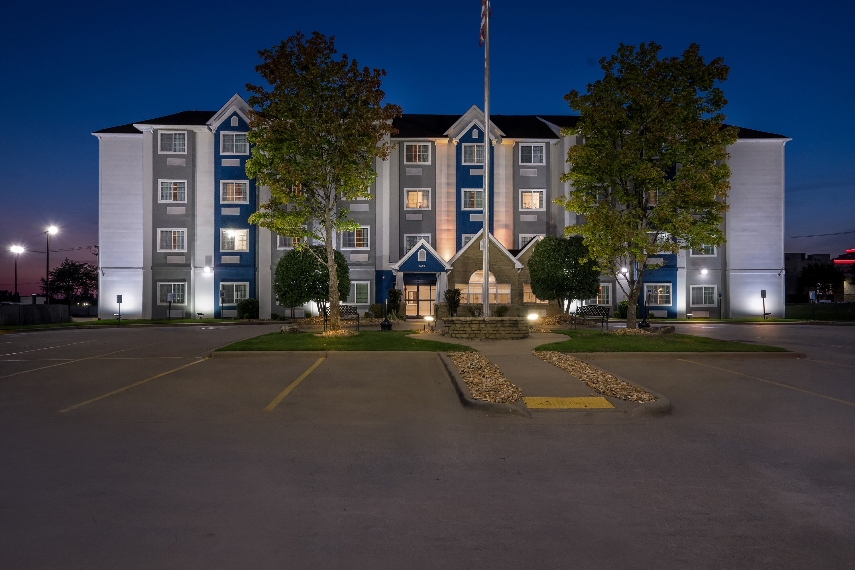 Exterior Night Image of Microtel Inn & Suites by Wyndham Conway hotel in Conway, Arkansas