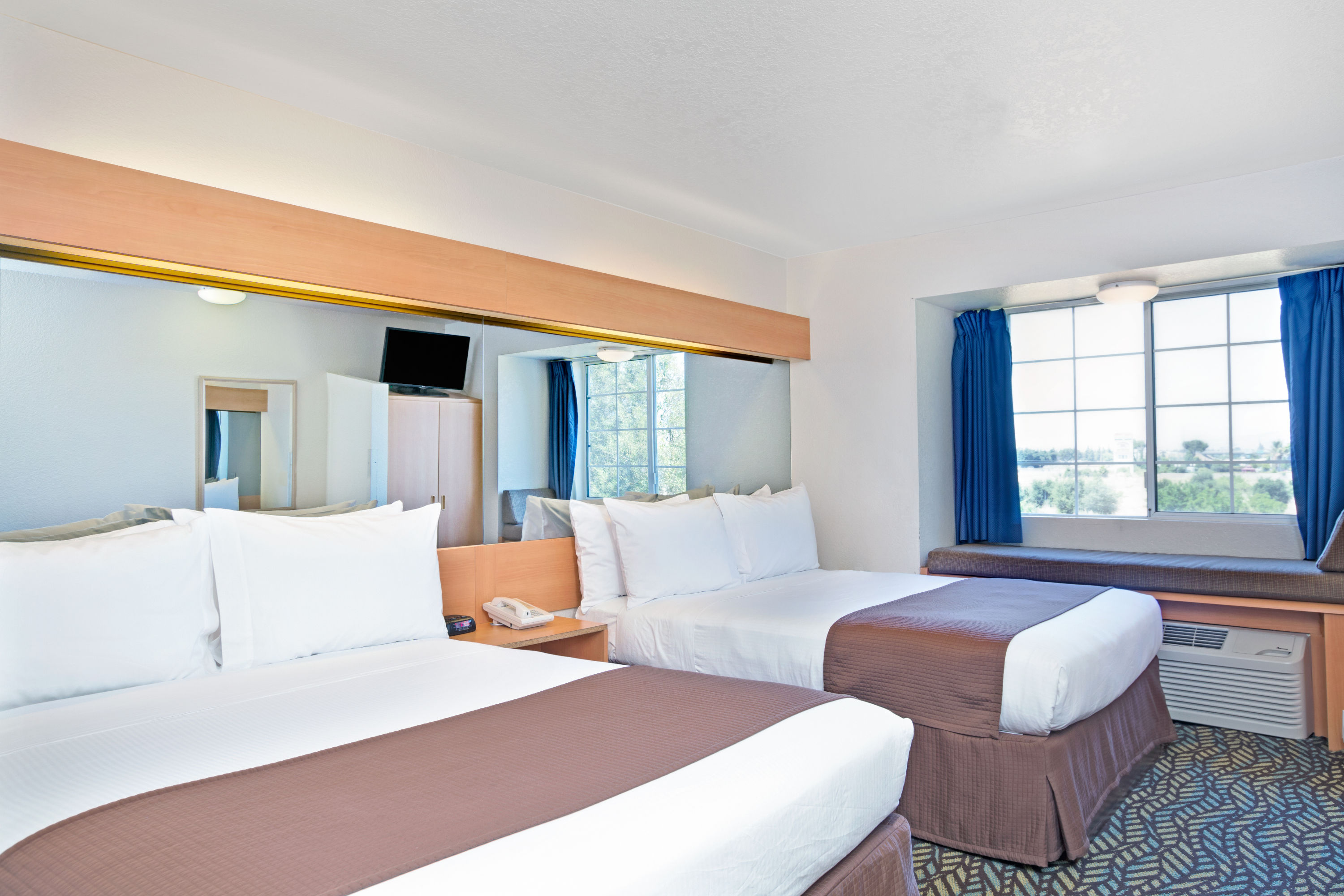 Guest room at the Microtel Inn & Suites by Wyndham Morgan Hill/San Jose Area in Morgan Hill, California