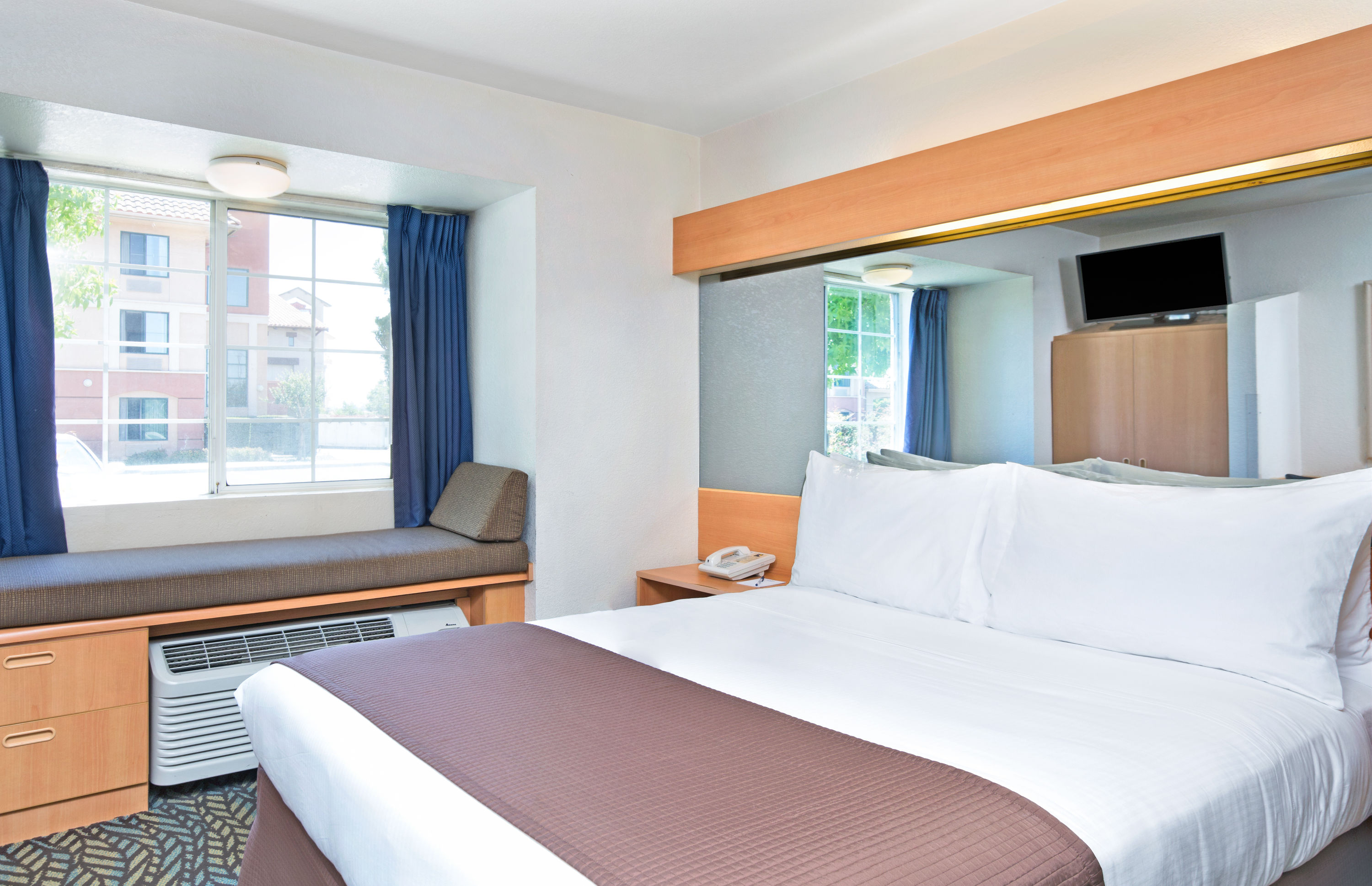 Guest room at the Microtel Inn & Suites by Wyndham Morgan Hill/San Jose Area in Morgan Hill, California