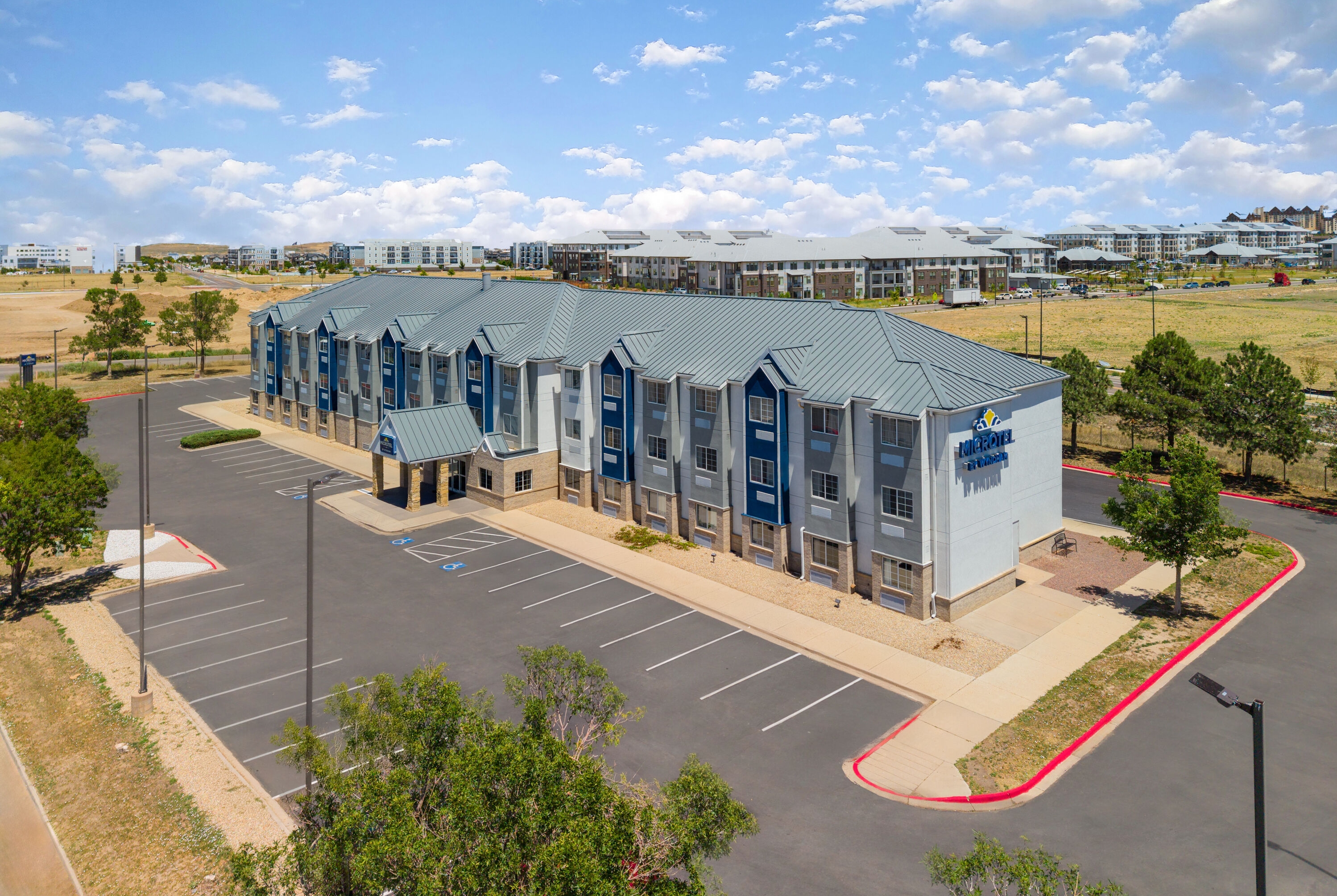 Exterior Day Image of Microtel Inn & Suites by Wyndham Denver Airport hotel in Denver, Colorado