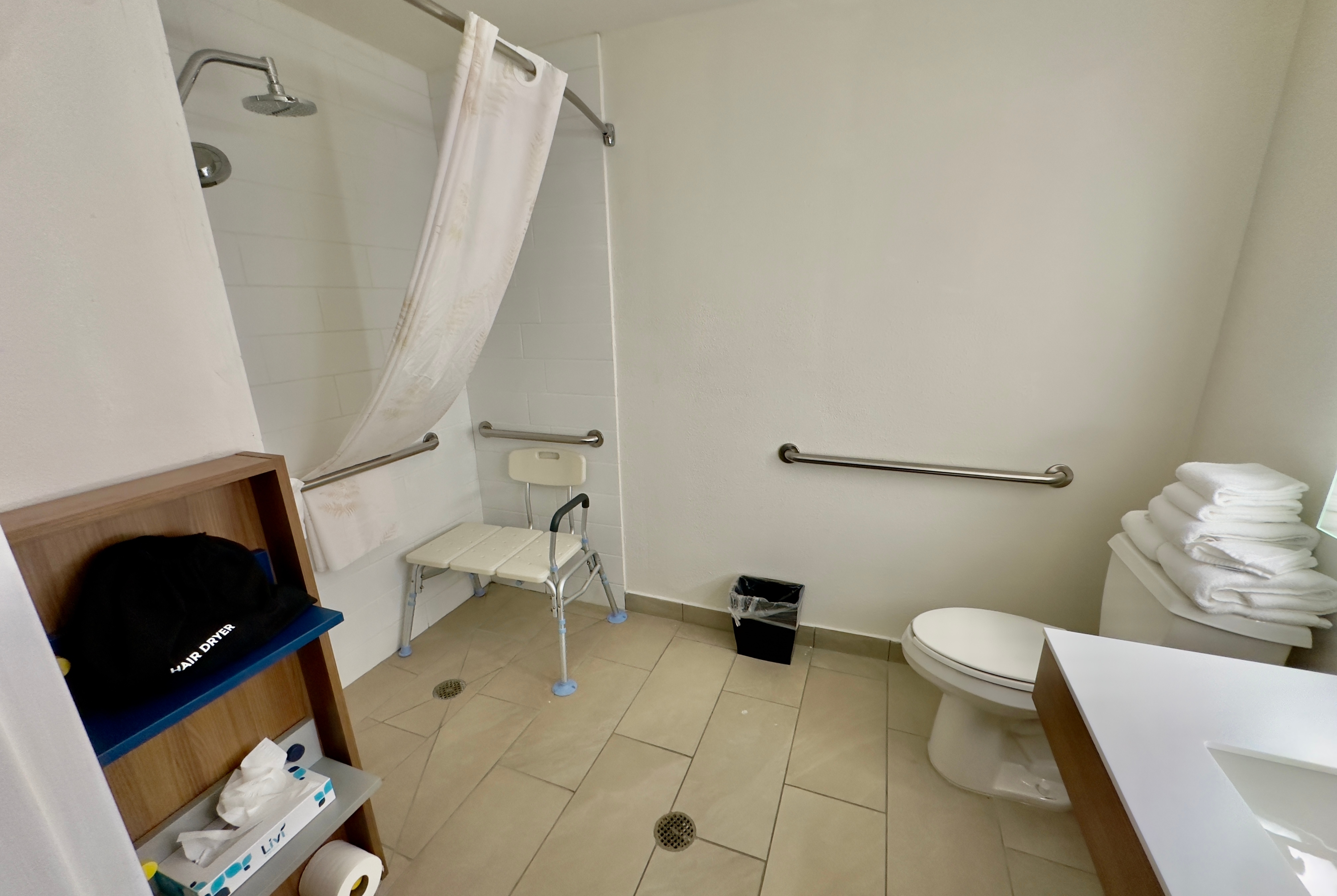 Guest room bath at the Microtel Inn & Suites by Wyndham Denver Airport in Denver, Colorado